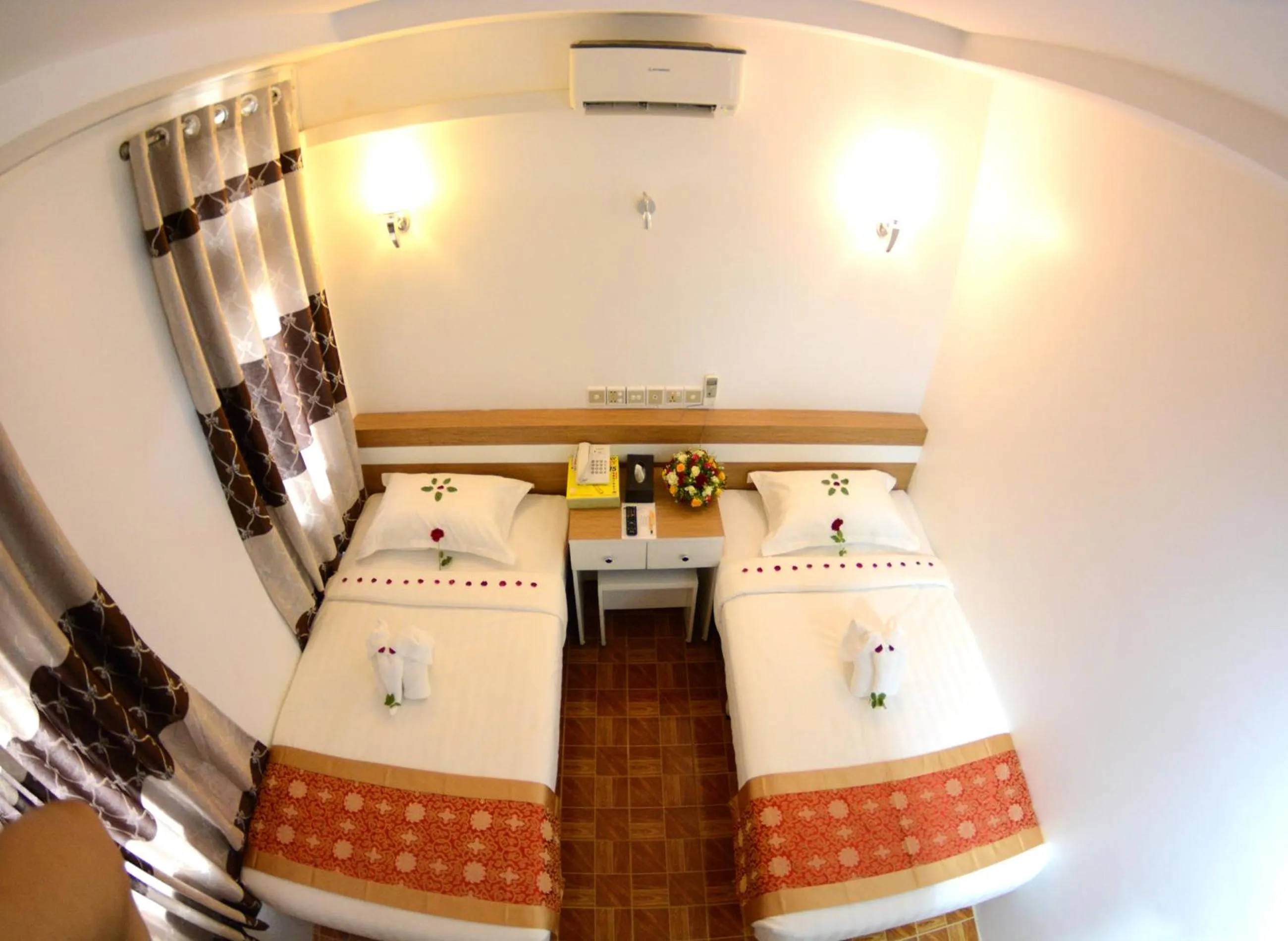 Bedroom in Kaung Myint Hotel