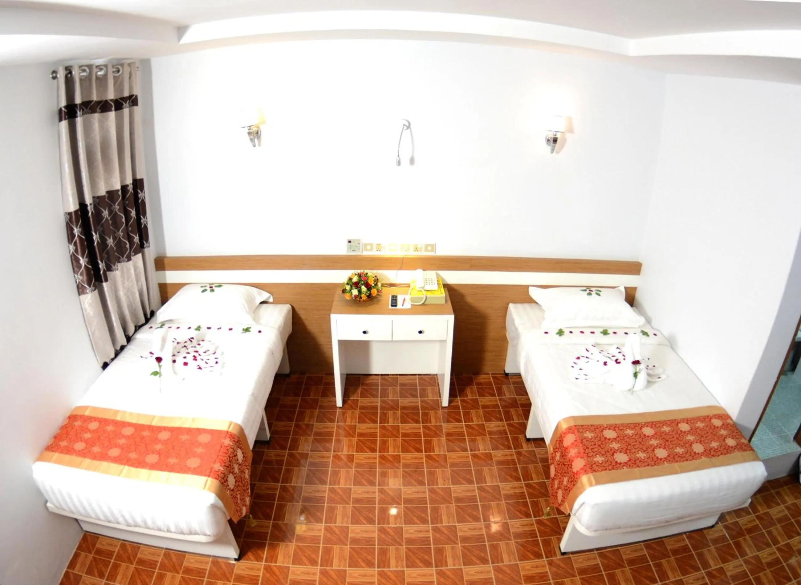 Bedroom in Kaung Myint Hotel