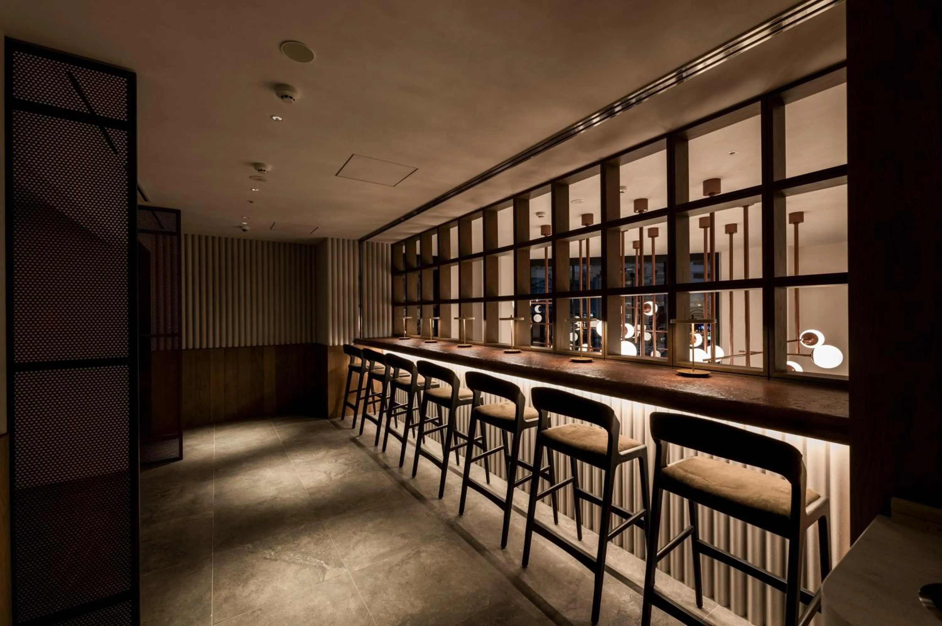 Communal lounge/ TV room in CINQS Hotel