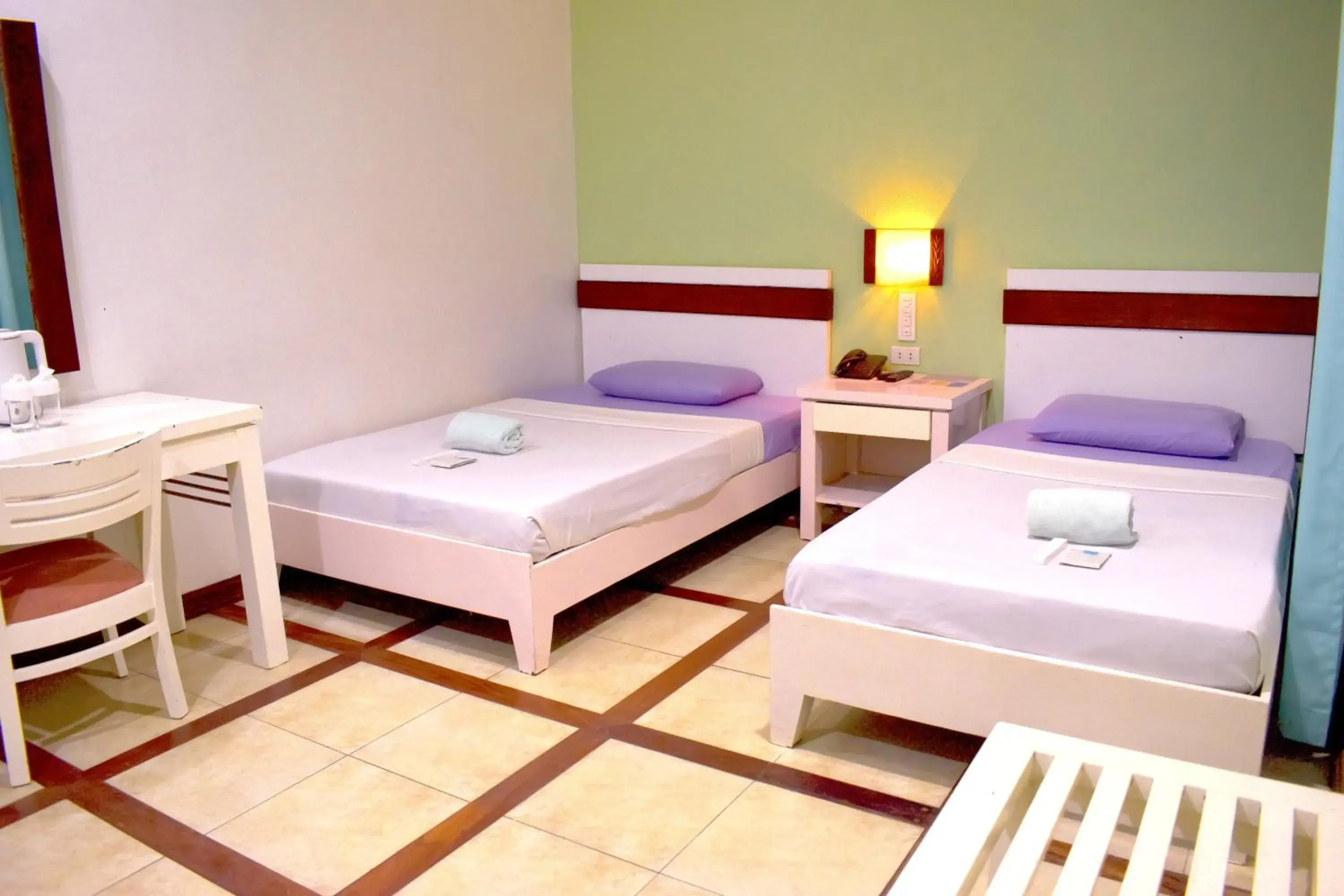 Bed in The Inns Bacolod Bed in The Inns Bacolod