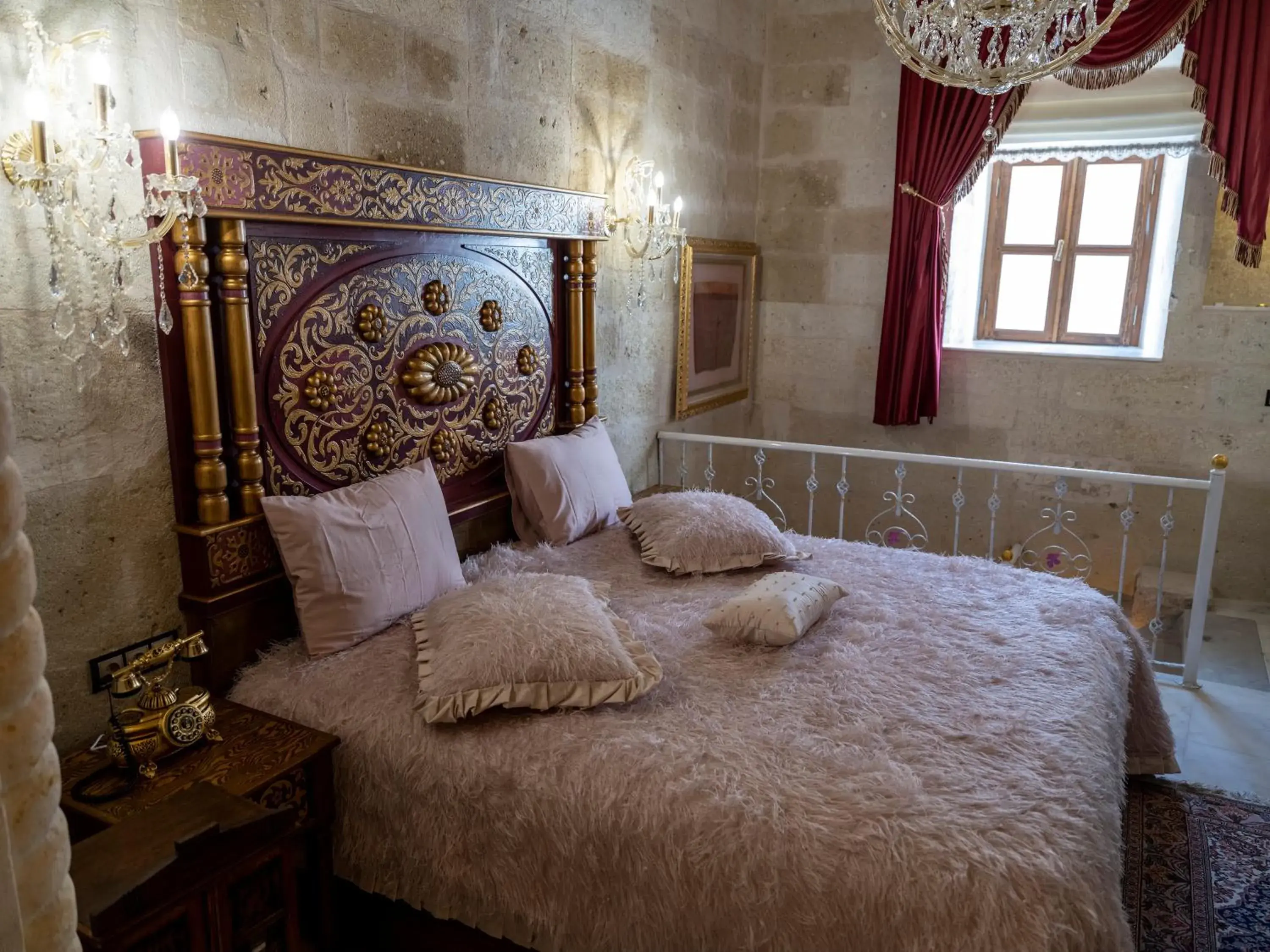 Bed in Elika Cave Suites & Spa Bed in Elika Cave Suites & Spa