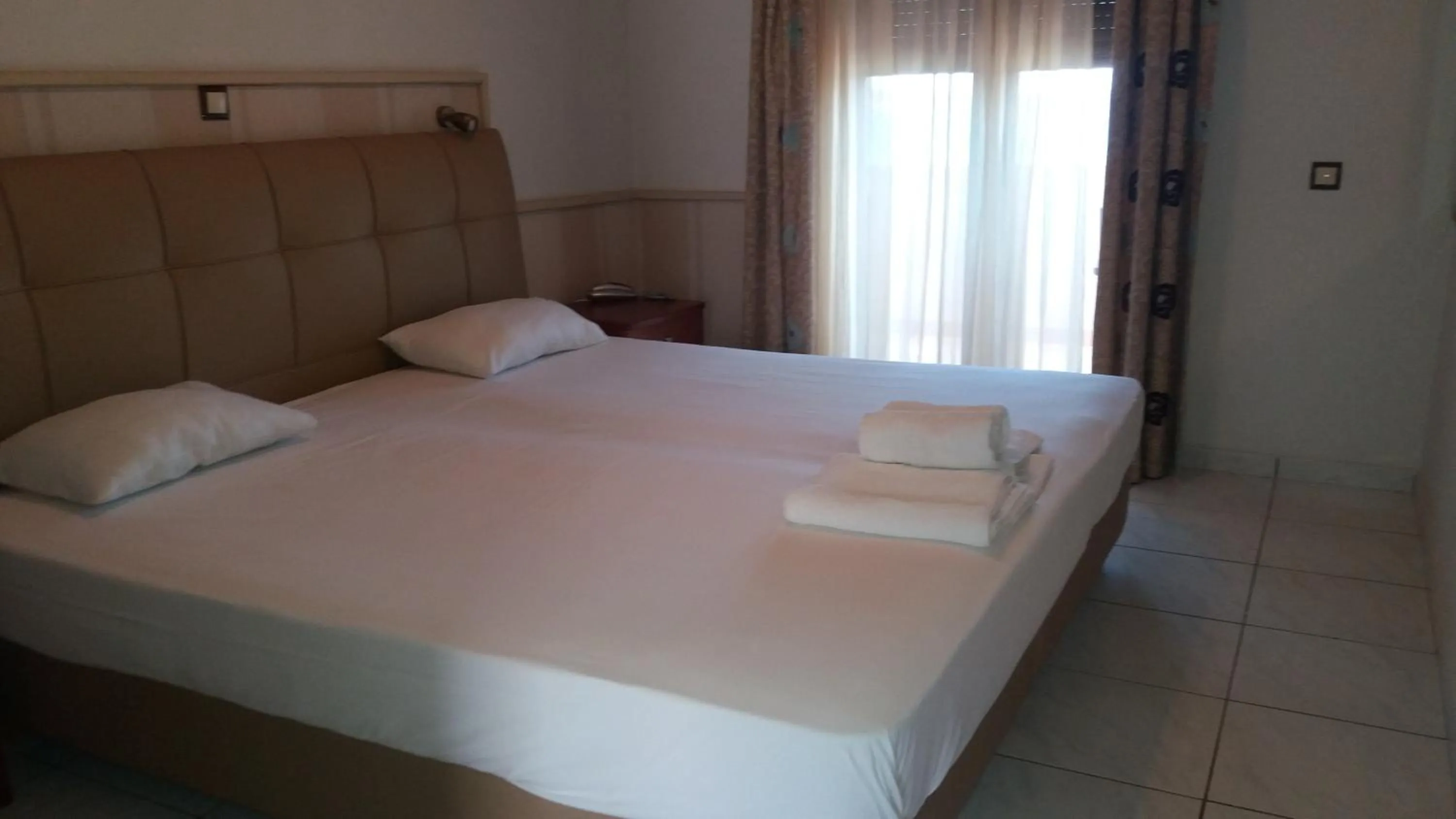 Bed in Aigeiros Apartments & restaurant