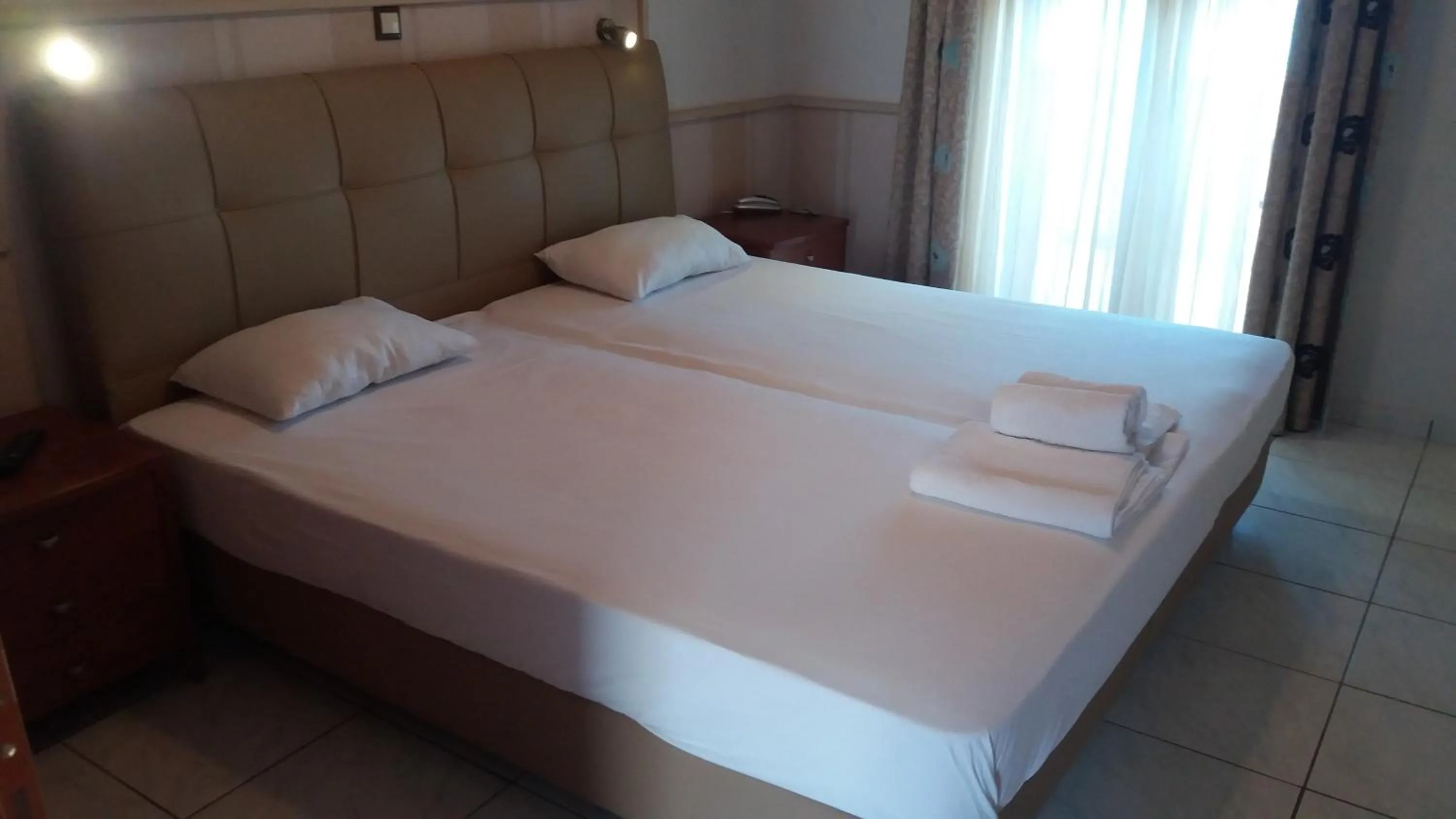 Bed in Aigeiros Apartments & restaurant
