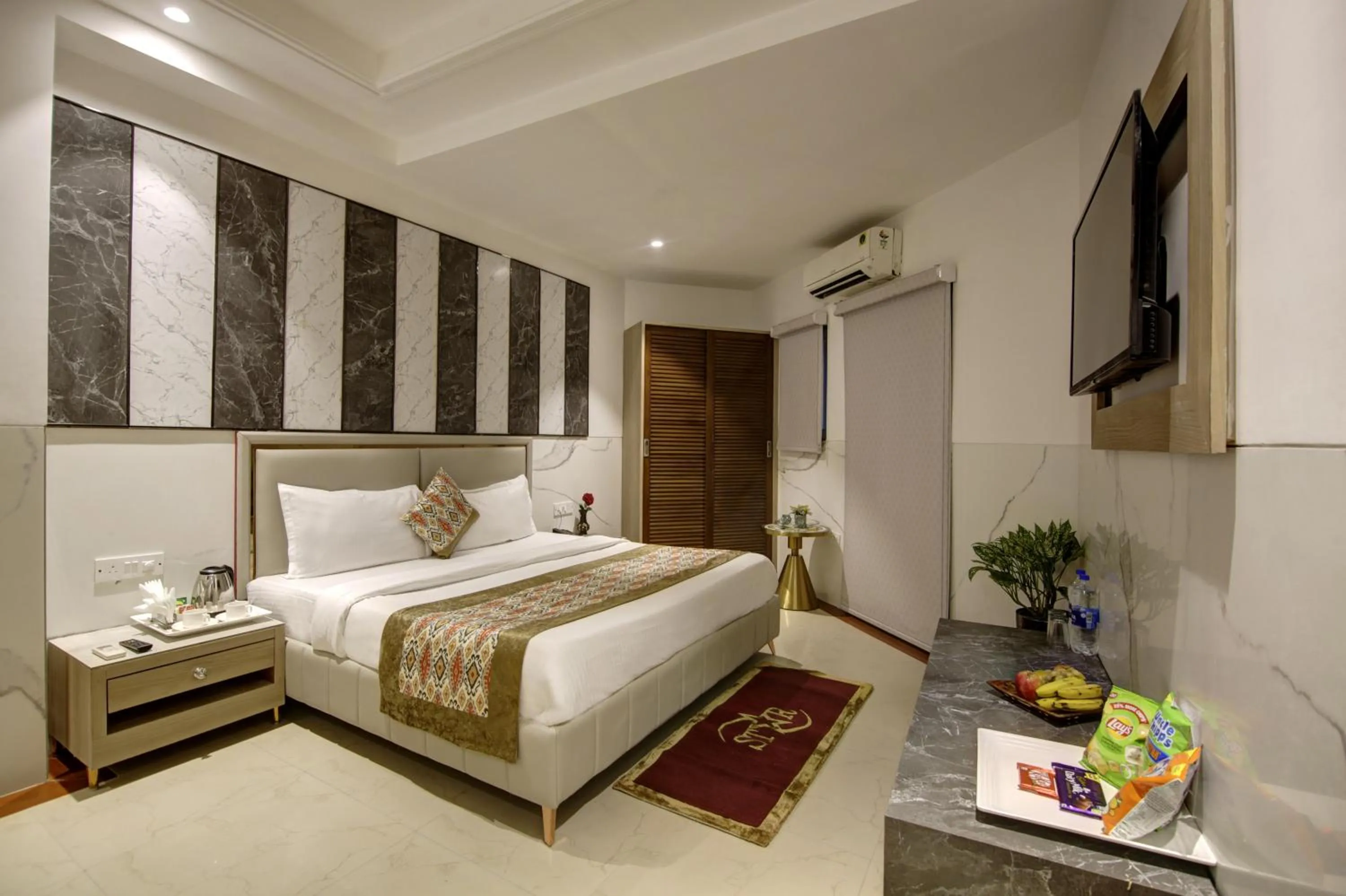 Bed in Hotel DELHI 37 by STAR GROUP