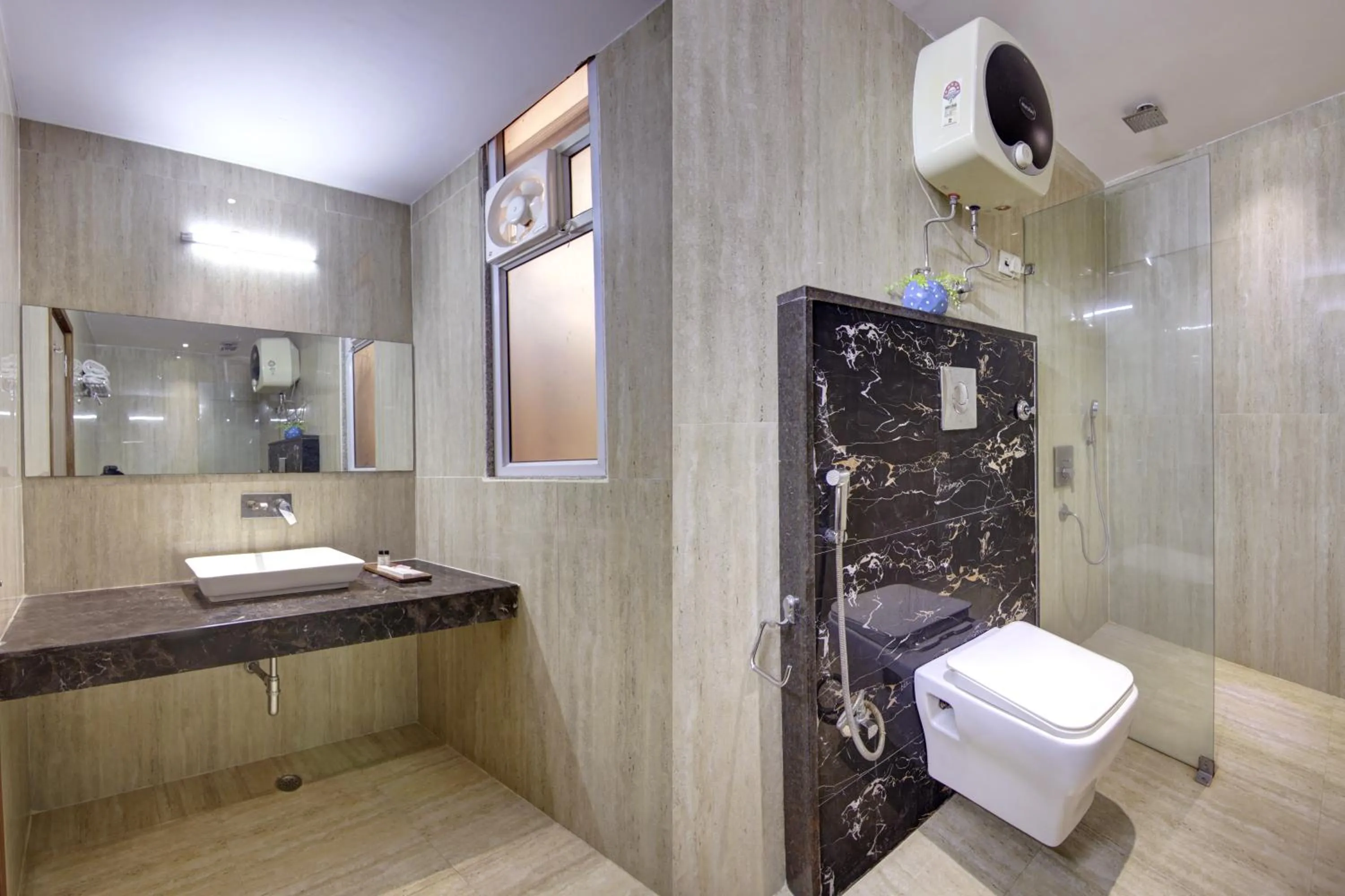 Bathroom in Hotel DELHI 37 by STAR GROUP