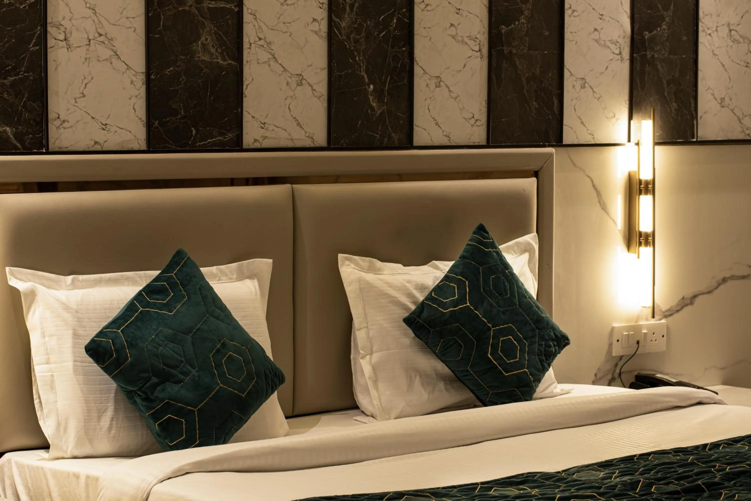 Bed in Hotel DELHI 37 by STAR GROUP