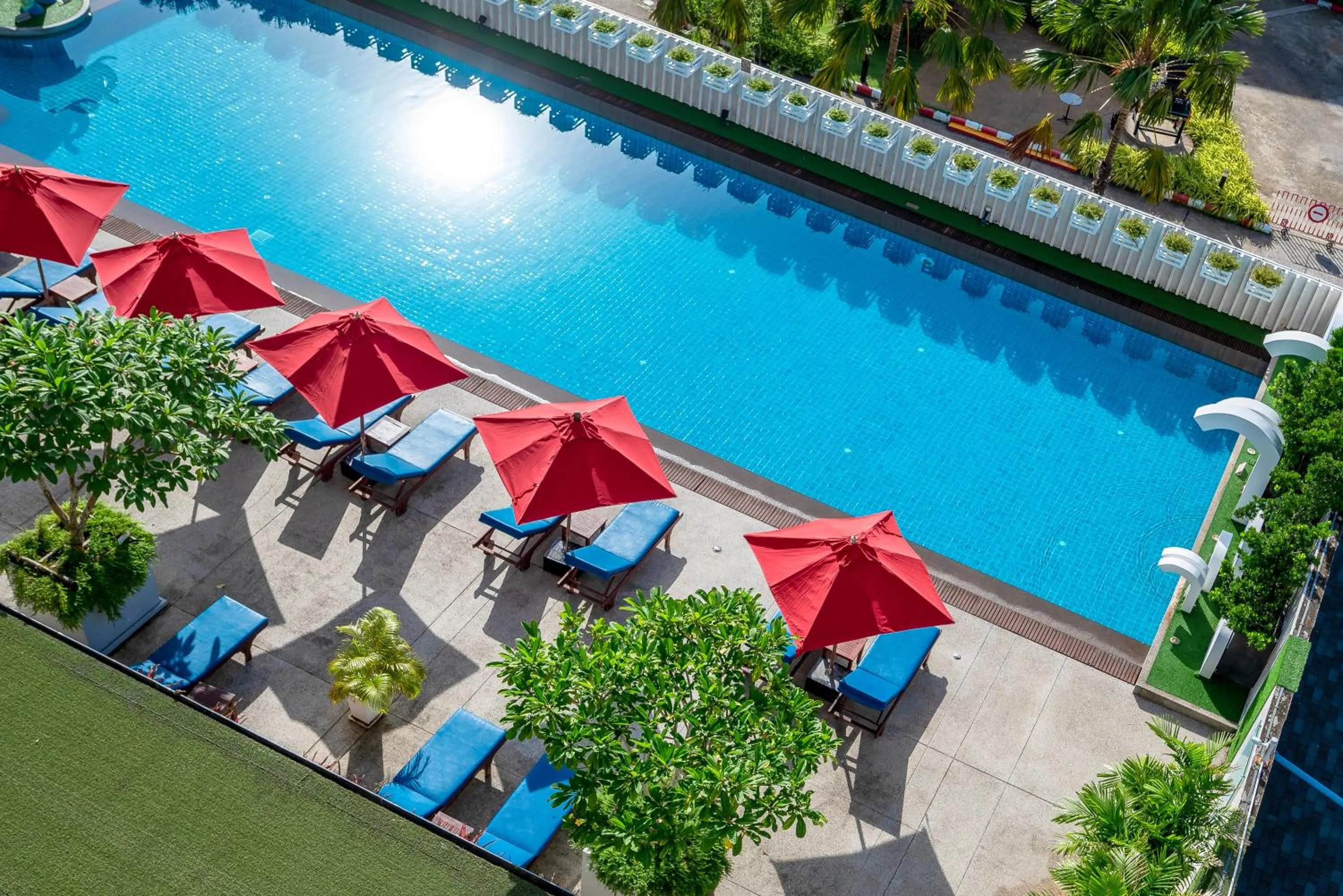 Swimming pool in Ramada by Wyndham Phuket Deevana