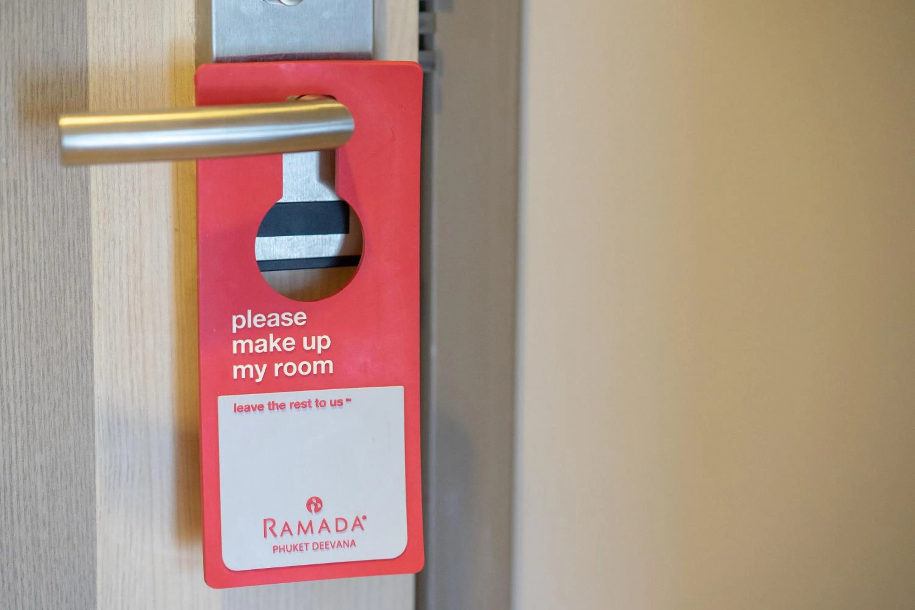 Property logo or sign in Ramada by Wyndham Phuket Deevana