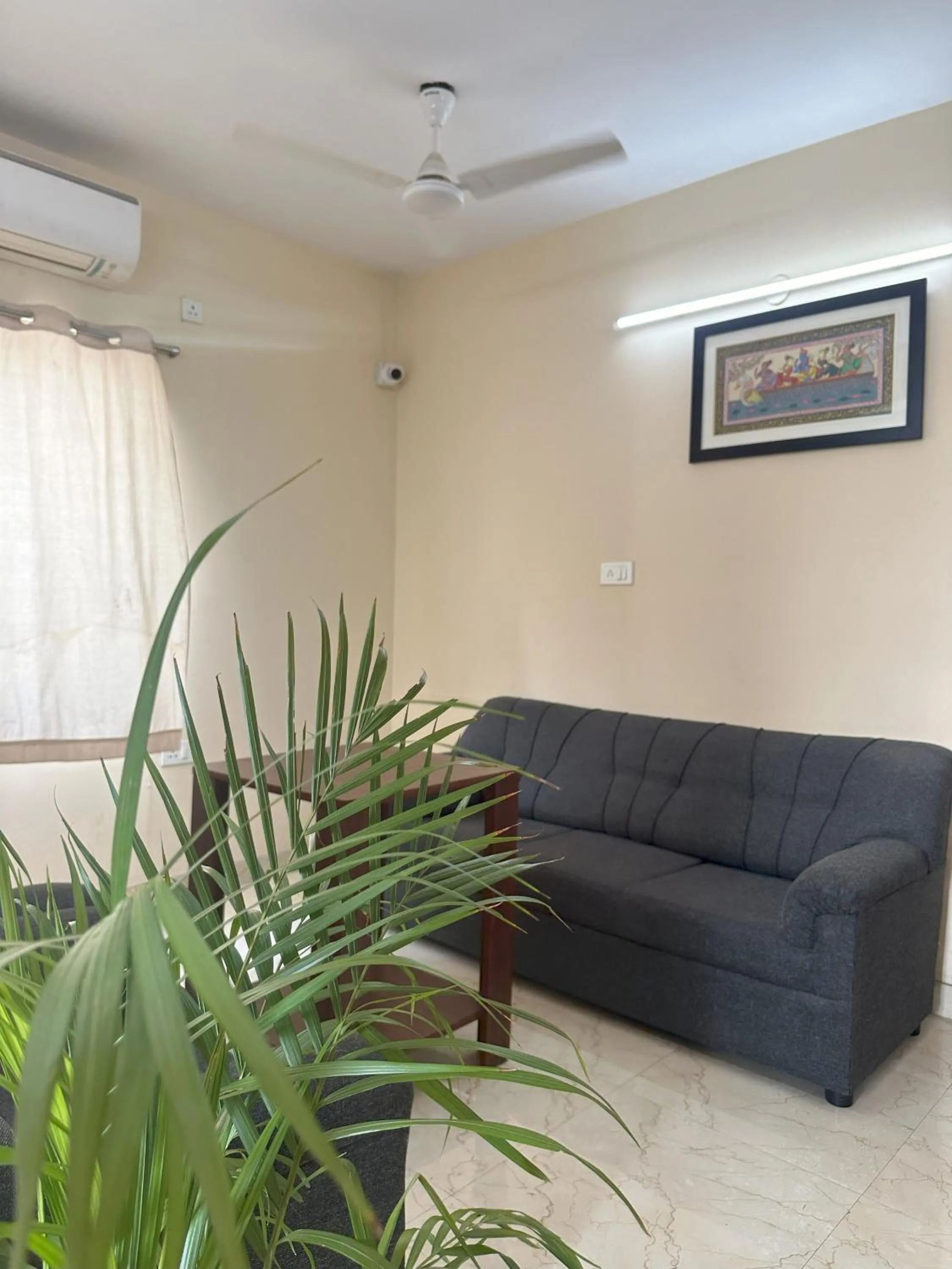 Communal lounge/ TV room in Ostro Inn New Town