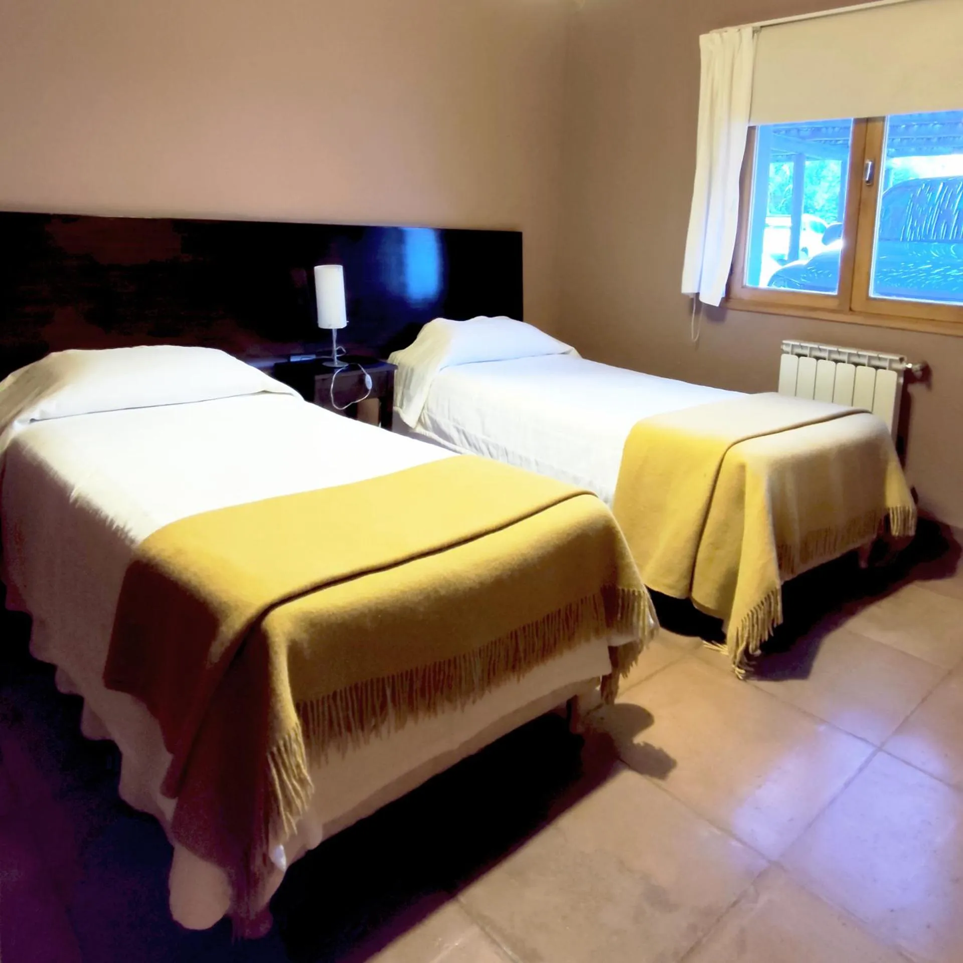 Bed in La Comarca Hotel