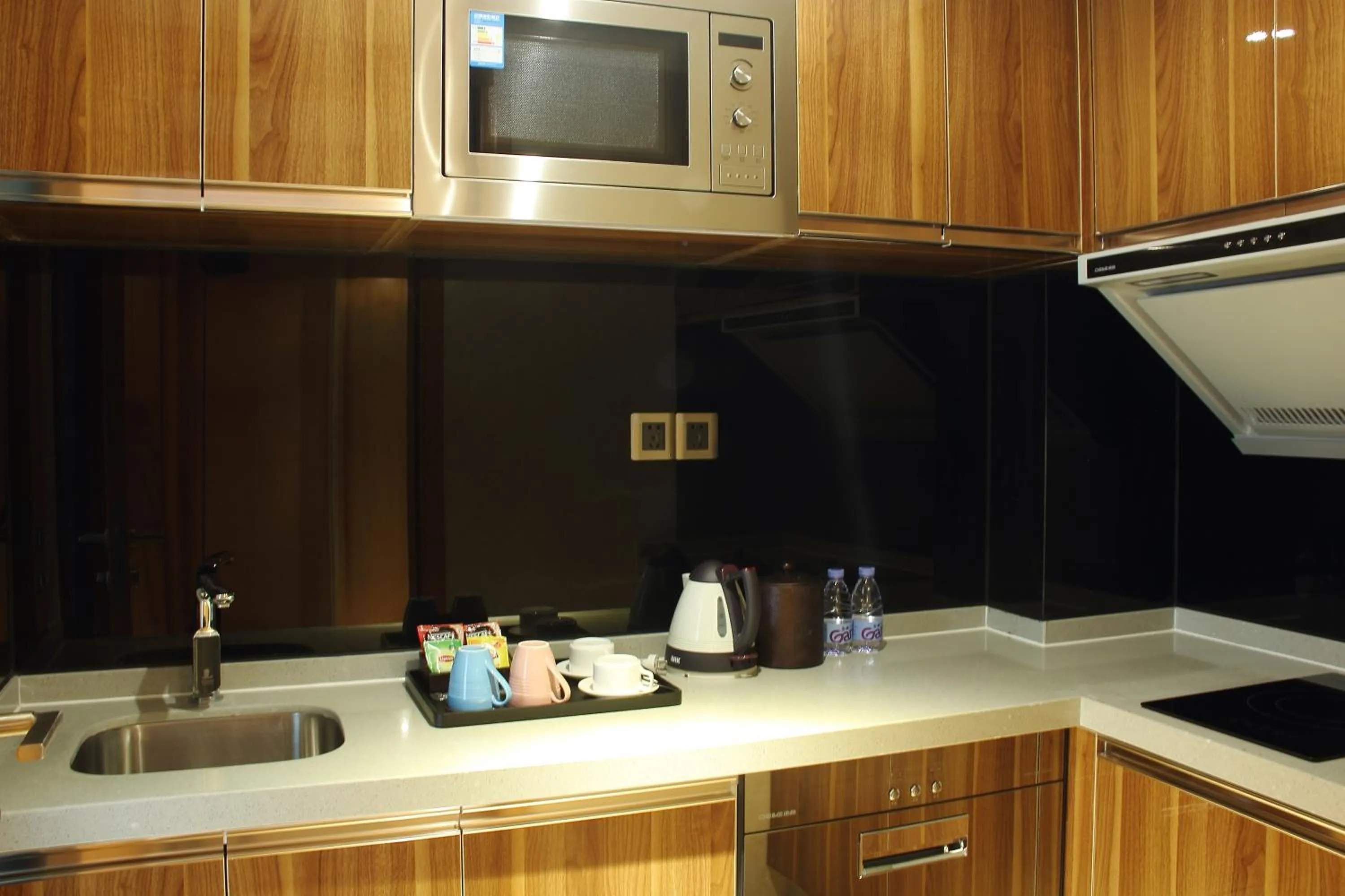 Kitchen or kitchenette in Sentosa Hotel Apartment Taoyuan Branch