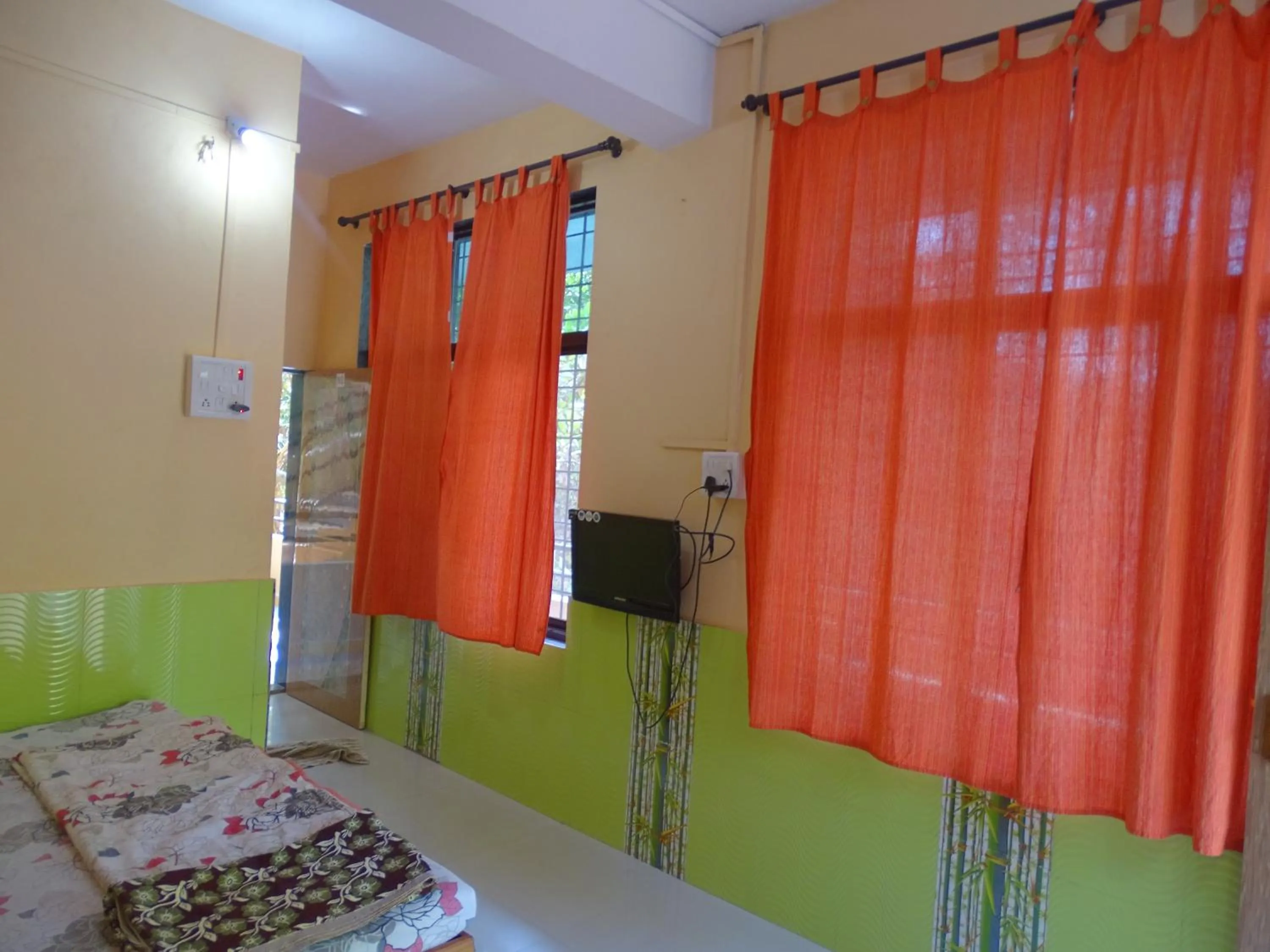 Bed in Jogalekar Cottage Alibaug