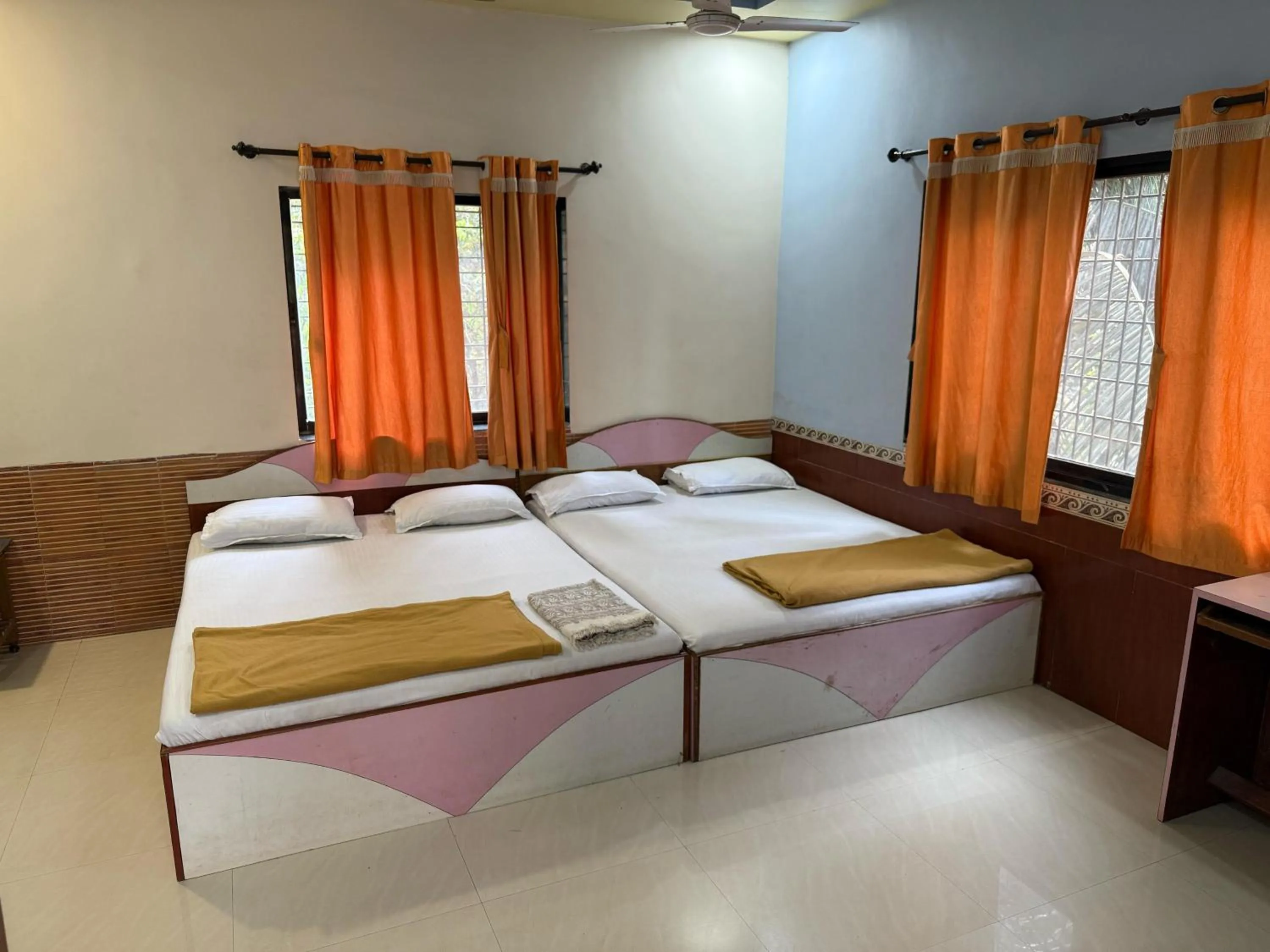 Bed in Jogalekar Cottage Alibaug