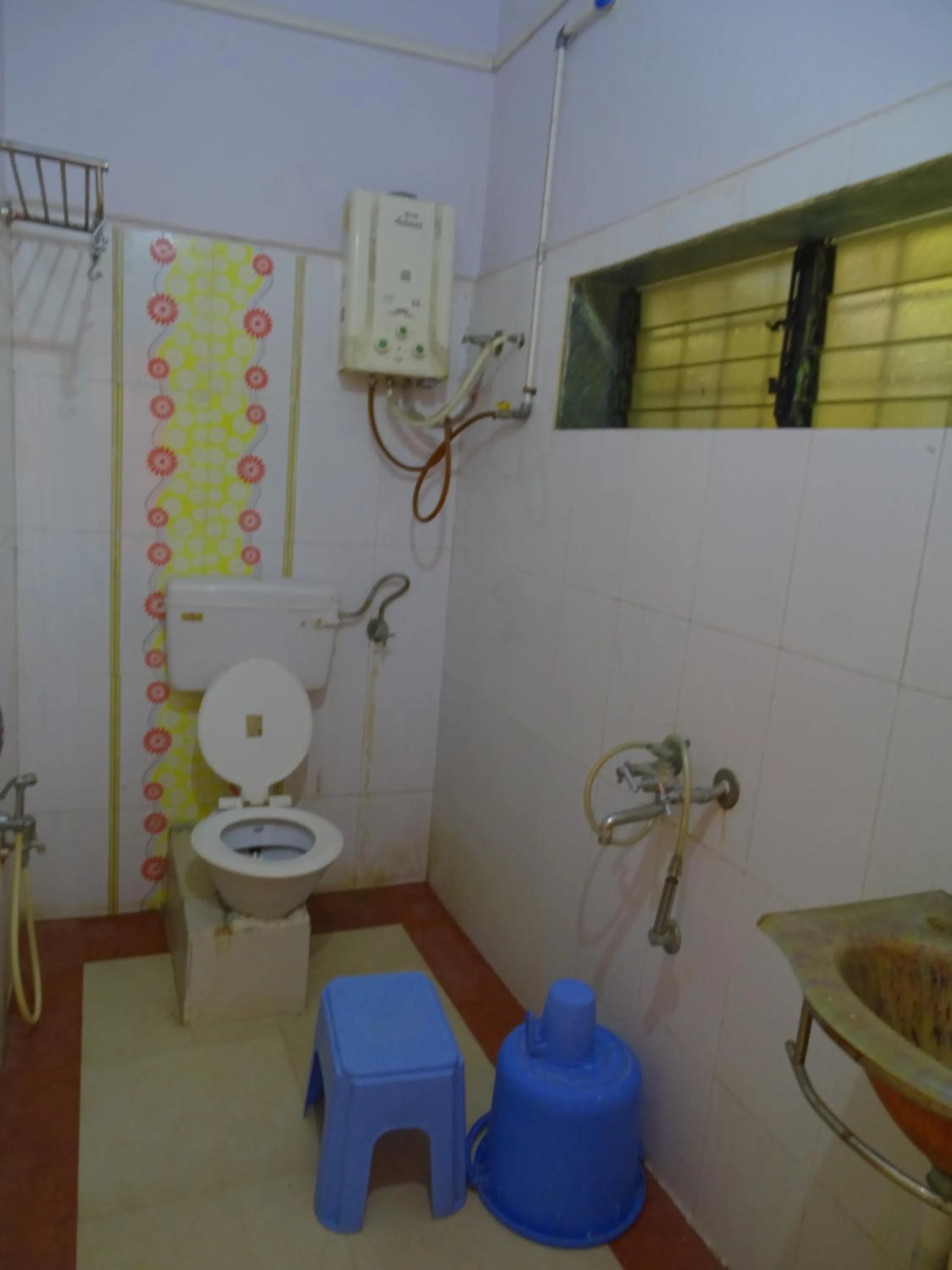 Bathroom in Jogalekar Cottage Alibaug