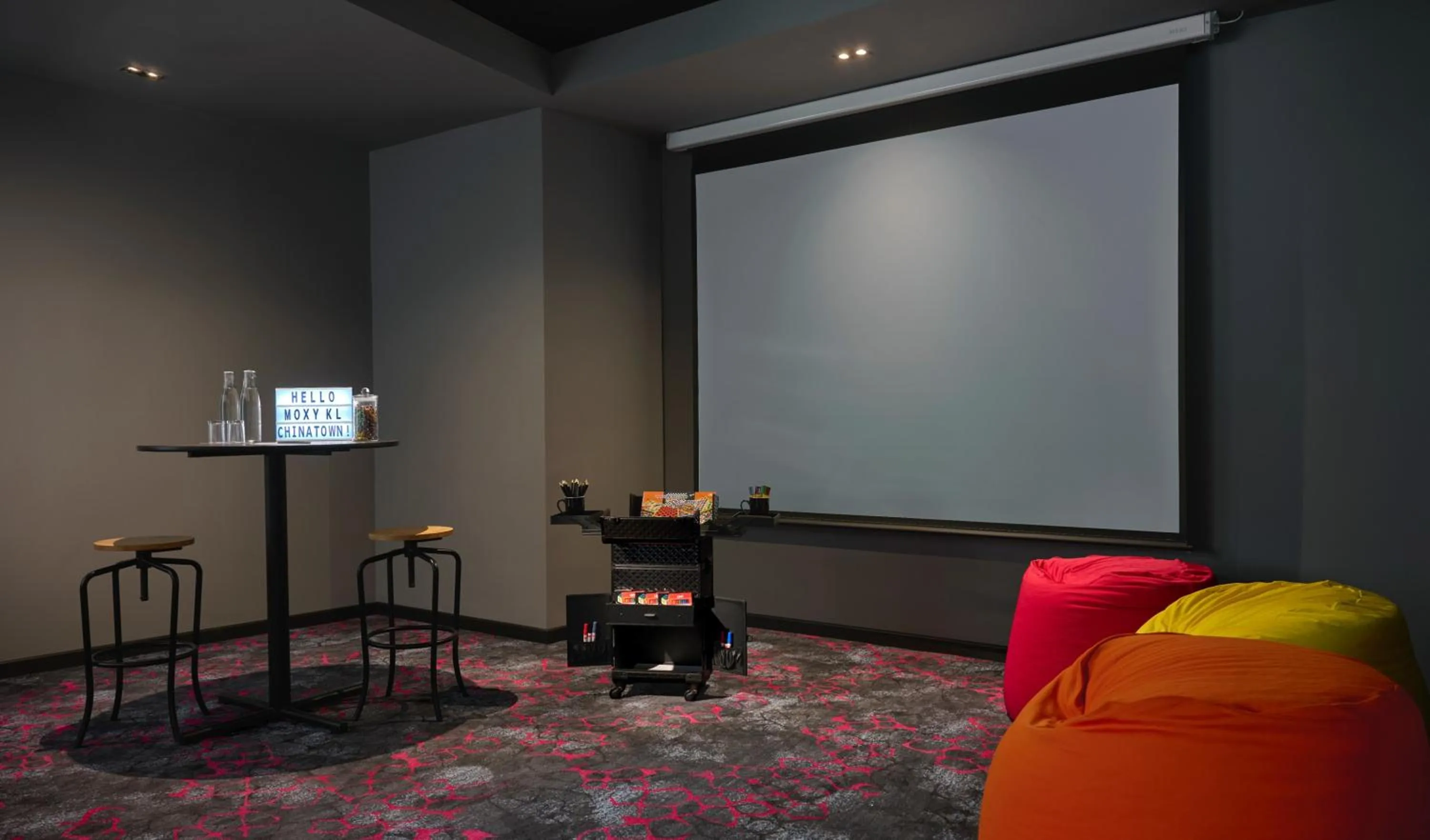 Communal lounge/ TV room in Moxy Kuala Lumpur Chinatown