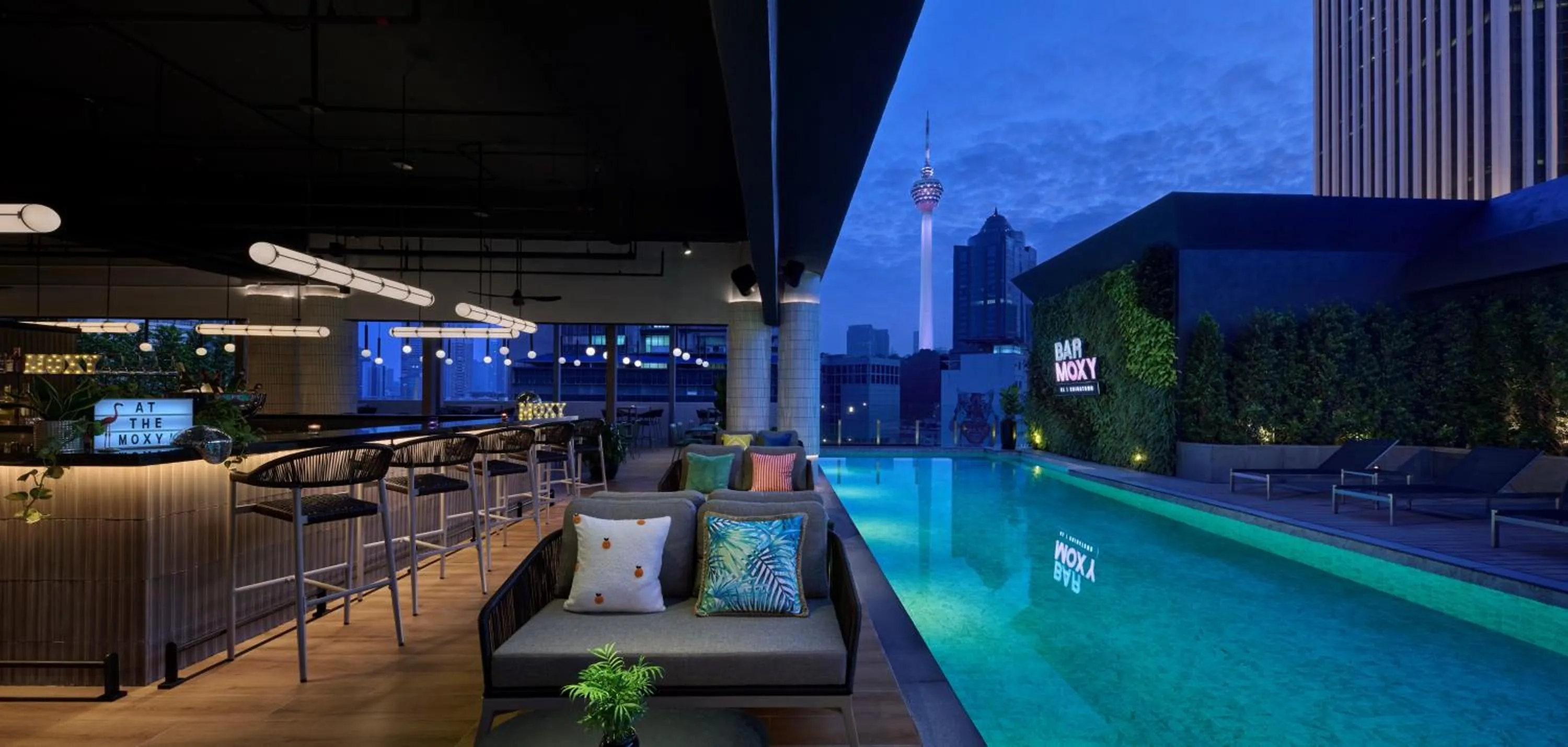 Communal lounge/ TV room in Moxy Kuala Lumpur Chinatown