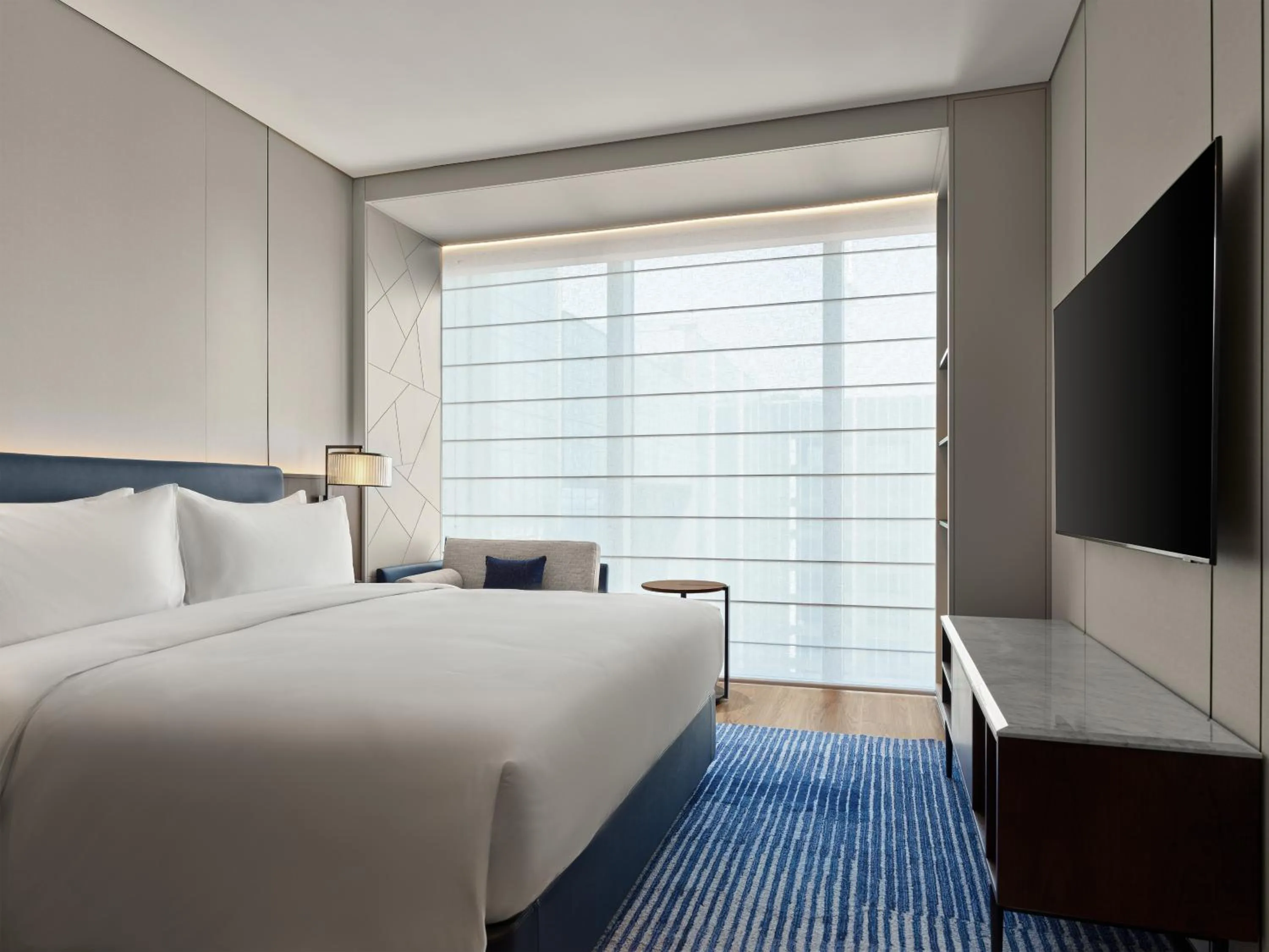 Photo of the whole room, Bed in Marriott Executive Apartments Suzhou Industrial Park