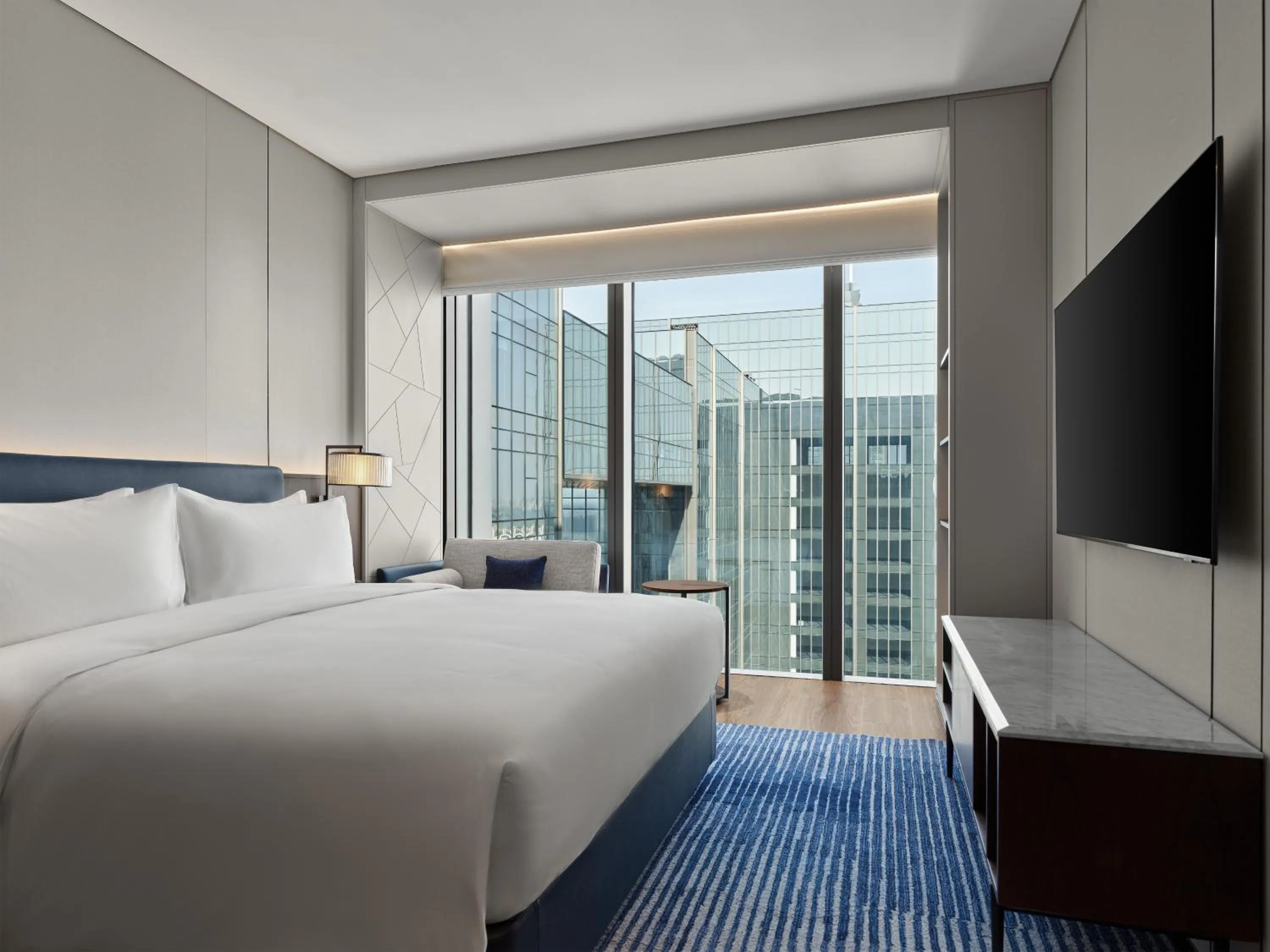 Photo of the whole room, Bed in Marriott Executive Apartments Suzhou Industrial Park