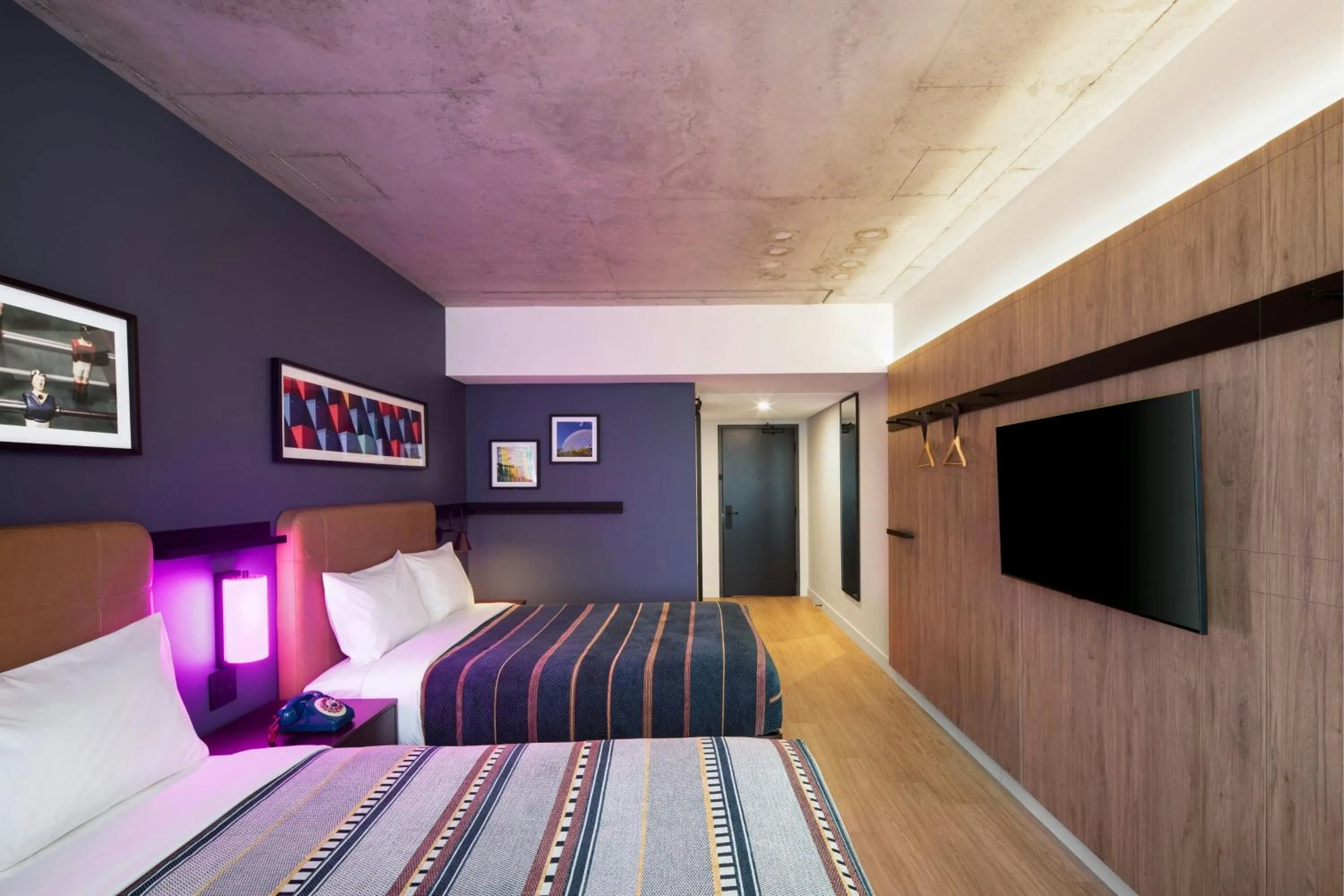 Photo of the whole room, Bed in Moxy Montreal Downtown