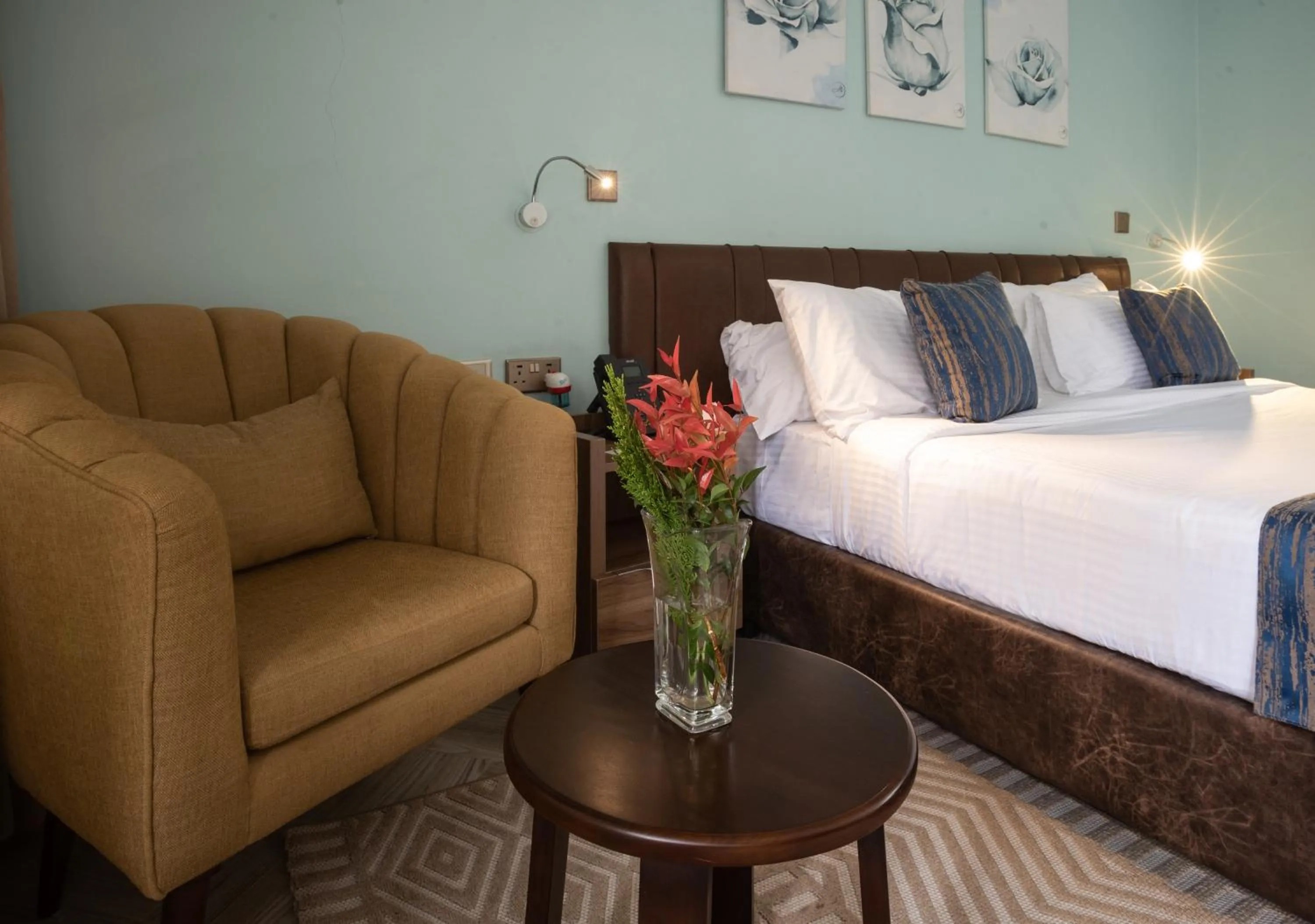 Seating area, Bed in Sportsview Hotel Kasarani