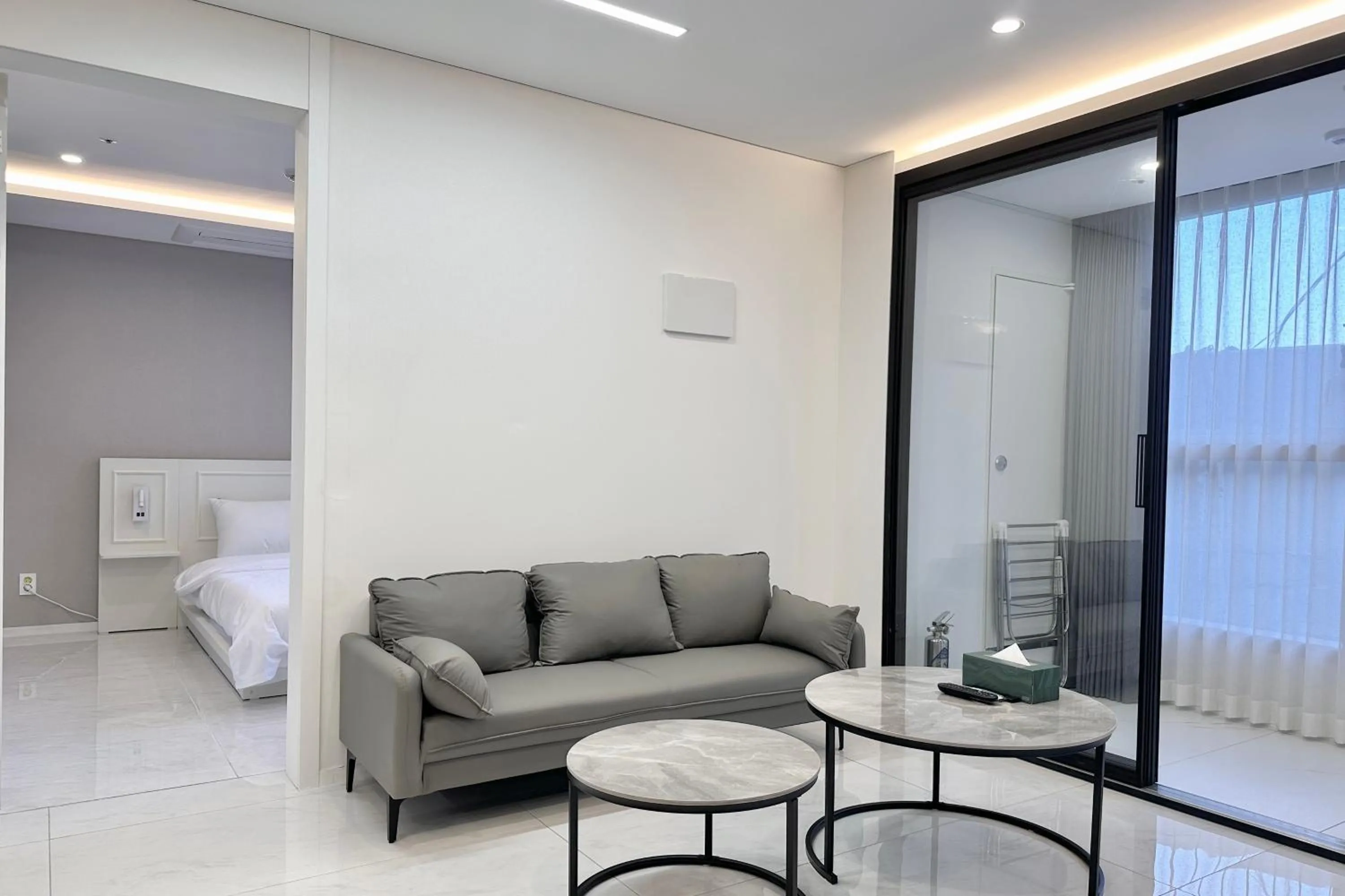 Living room, Bed in Zizel Suite Room Seocho