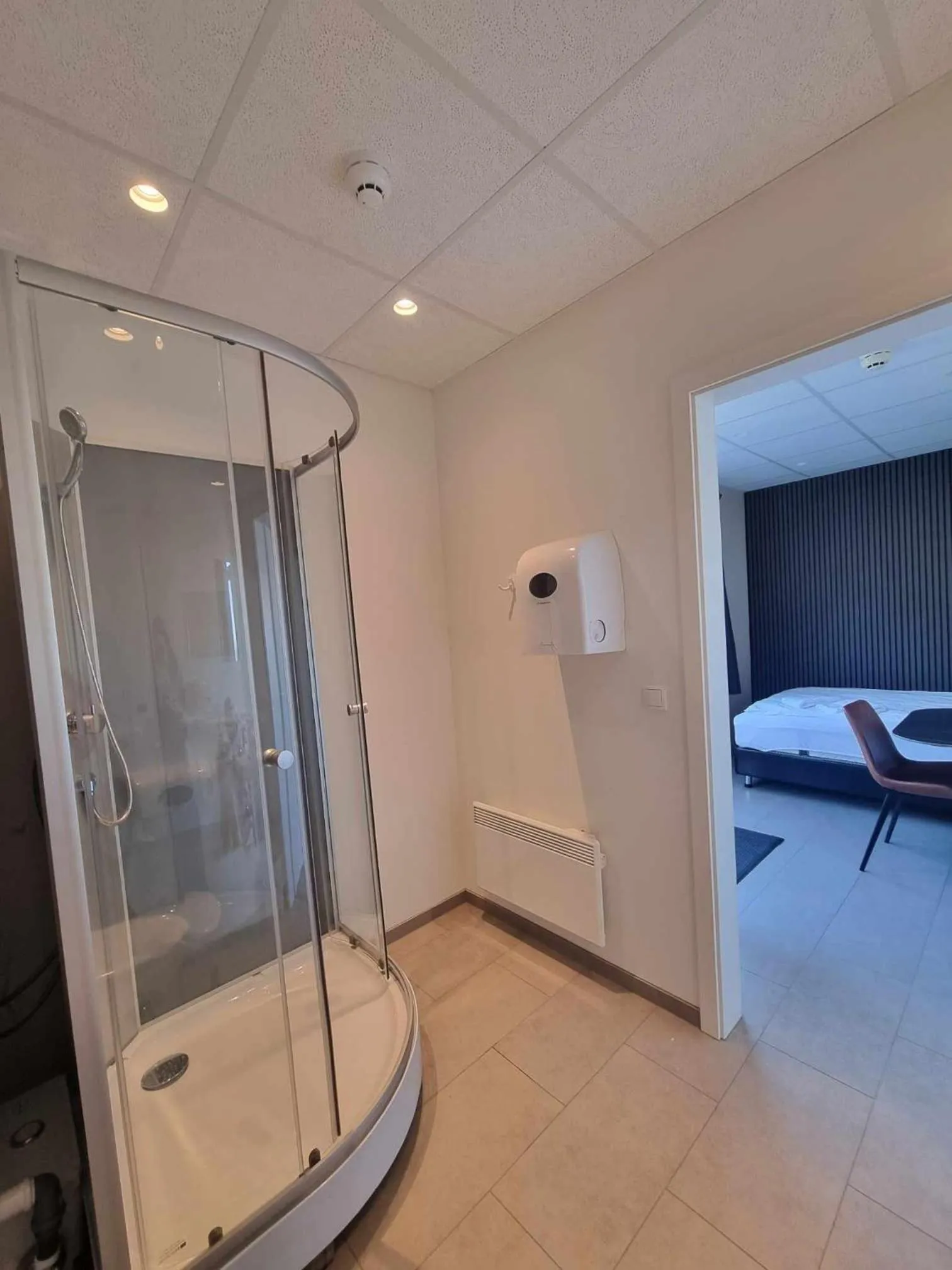 Shower, Bed in Við Hafið Guesthouse