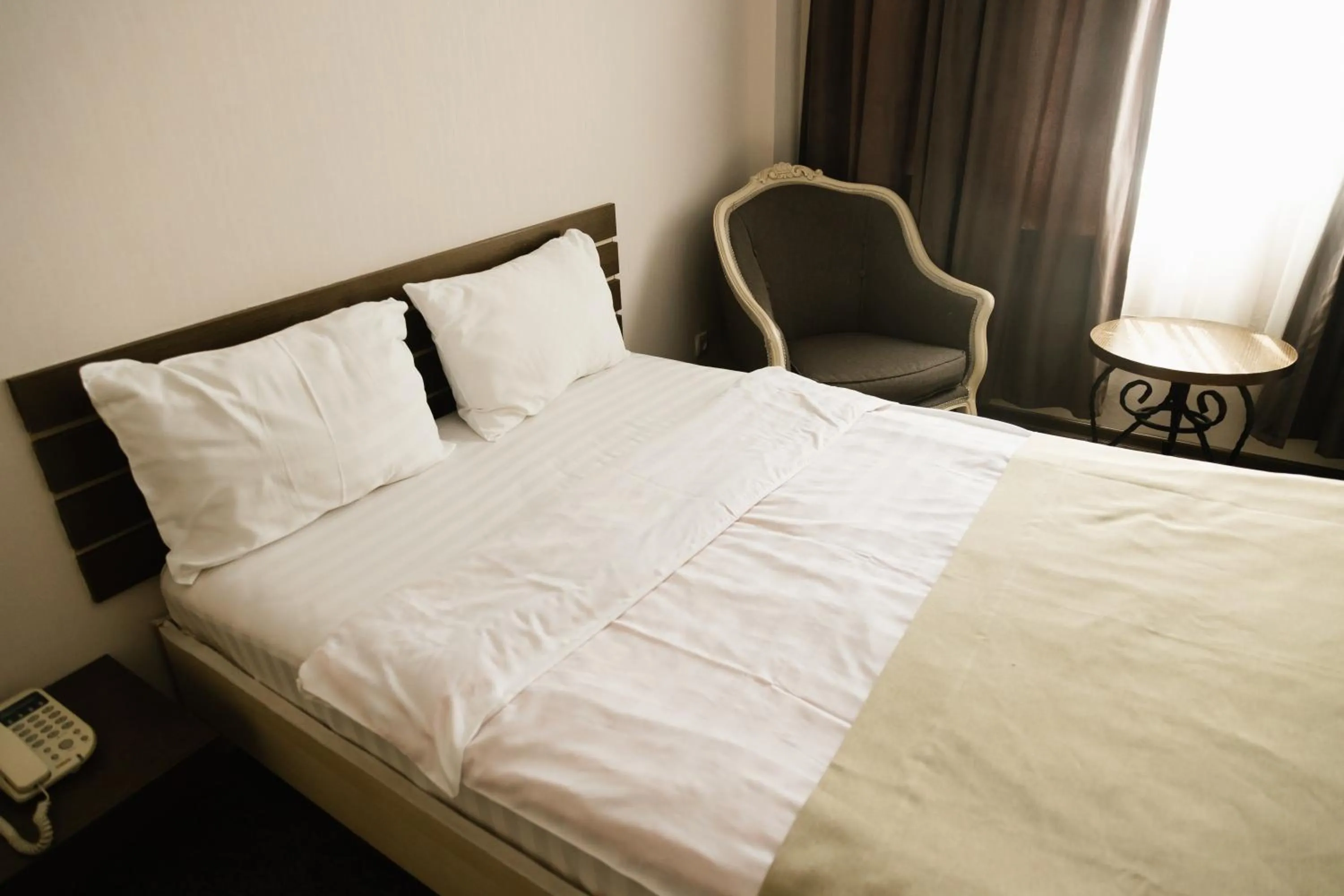 Bed in Reikartz City Tbilisi Hotel