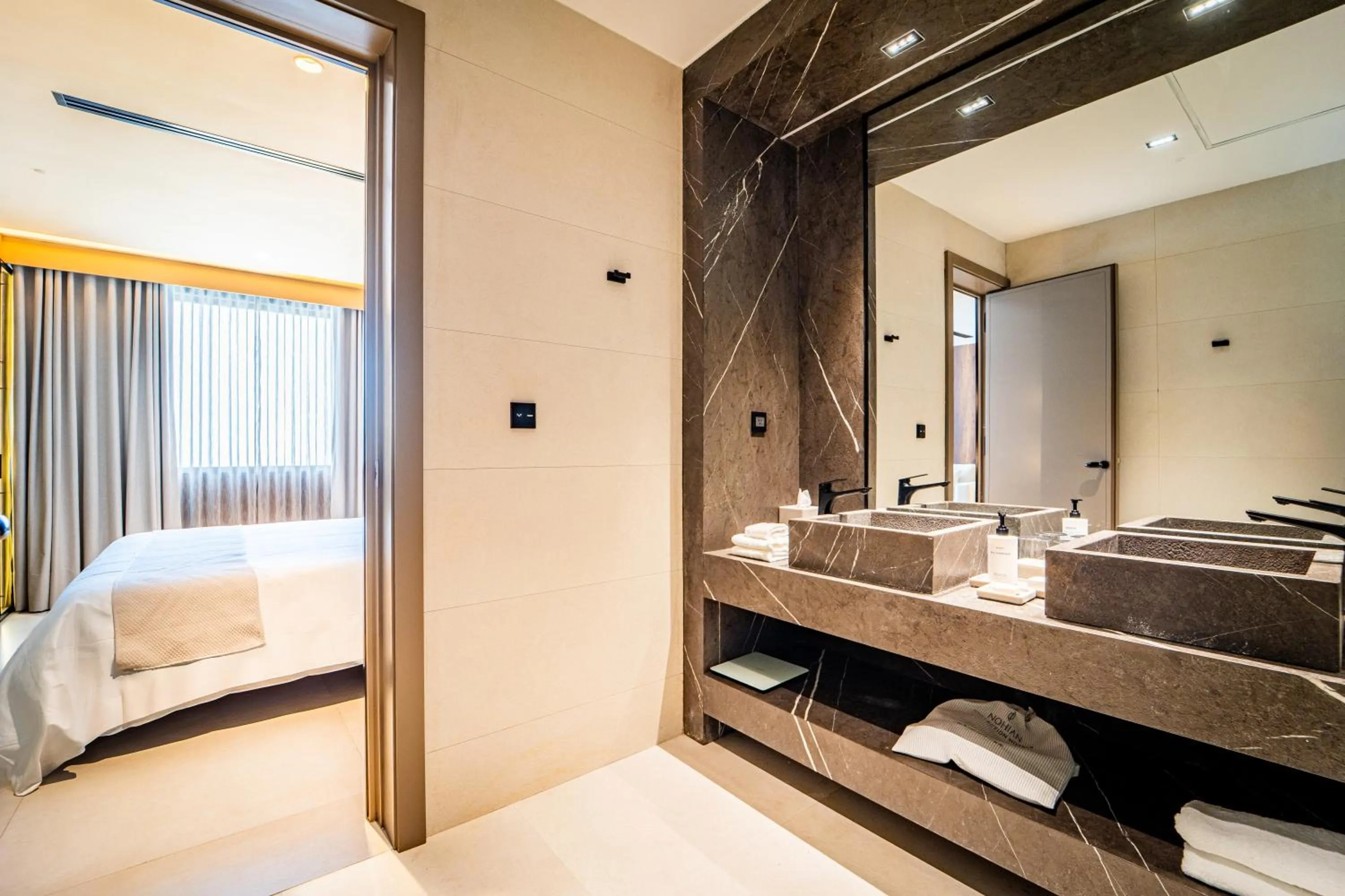 Bathroom, Bed in Nohian Collection Hotels