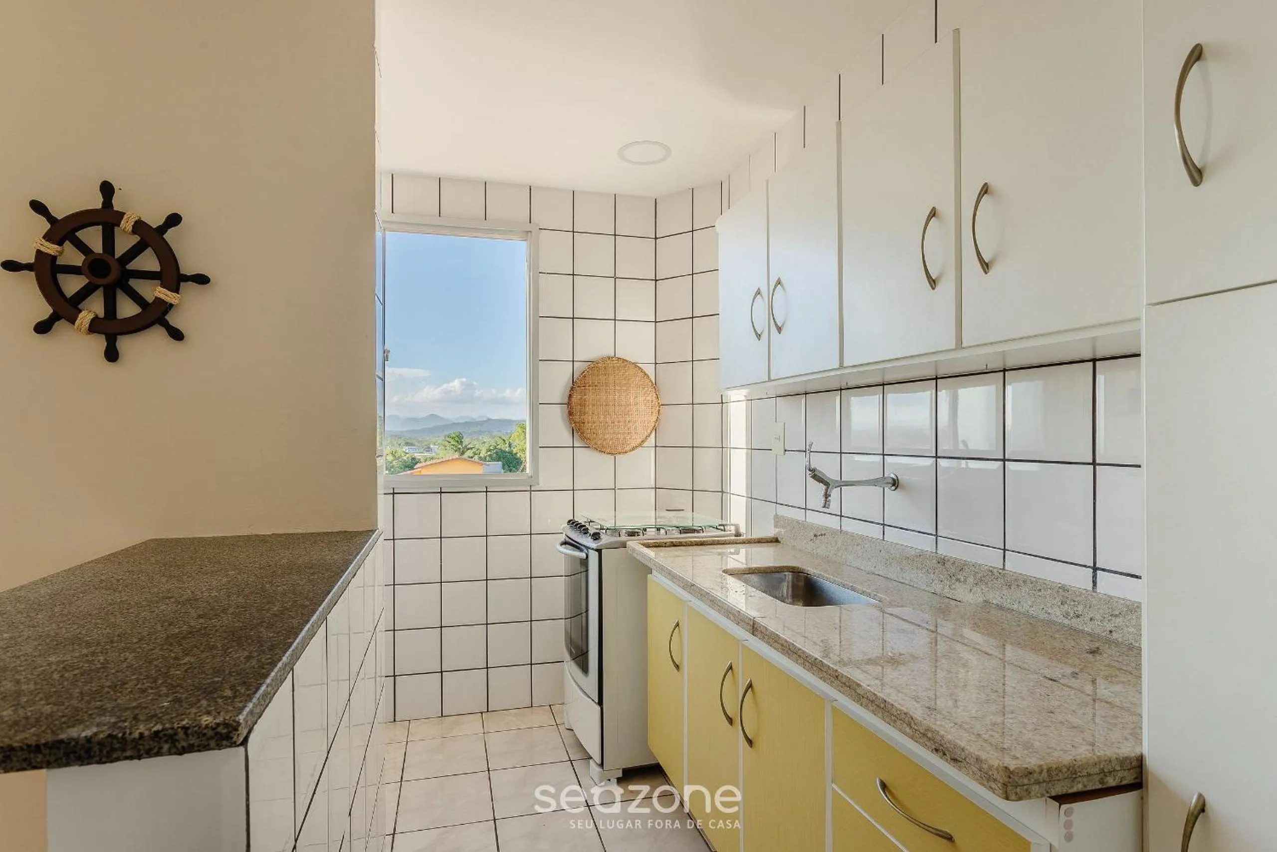 Kitchen or kitchenette in Apartamentos a 160m da Praia em Guarapari - PVEs