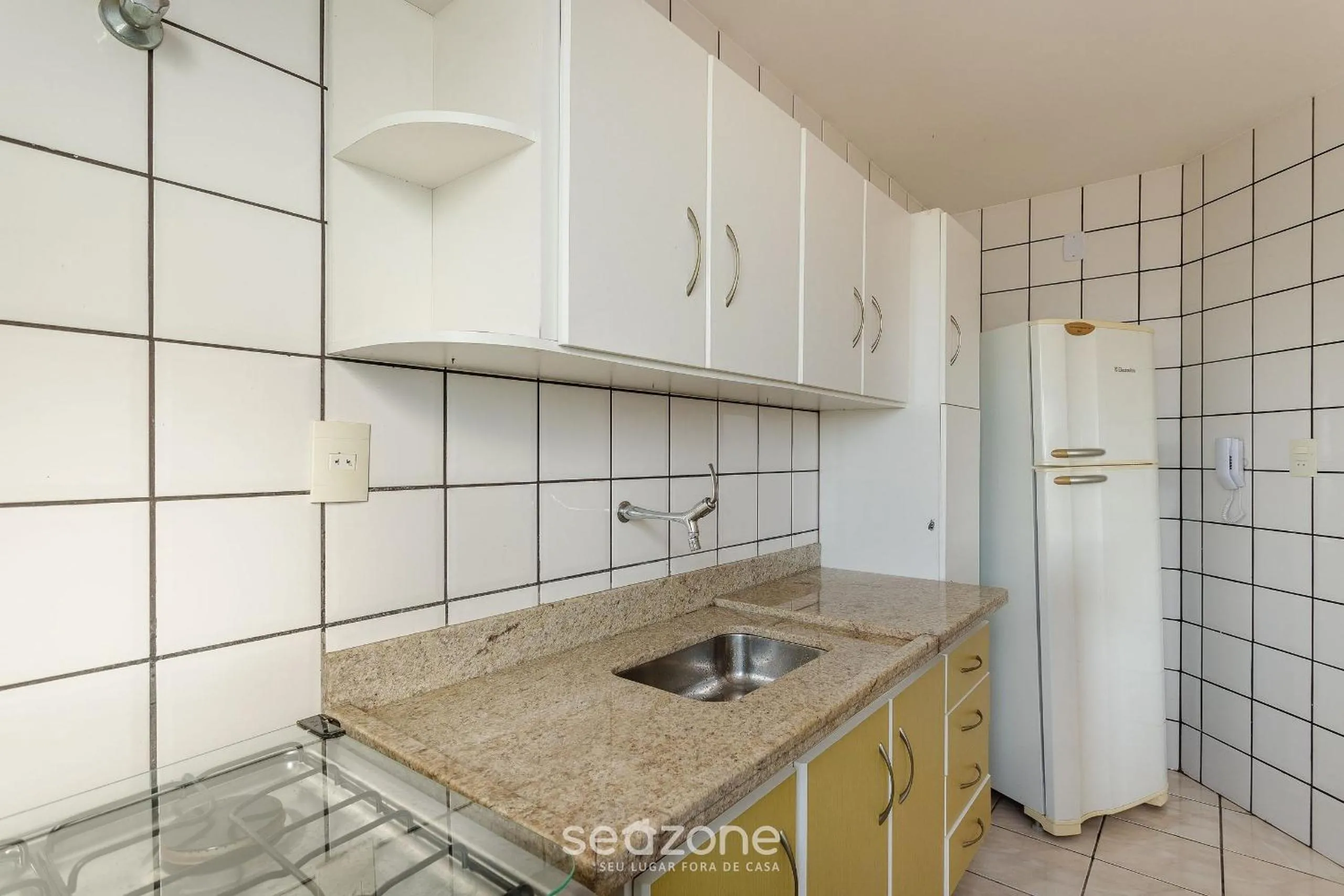 Kitchen or kitchenette in Apartamentos a 160m da Praia em Guarapari - PVEs