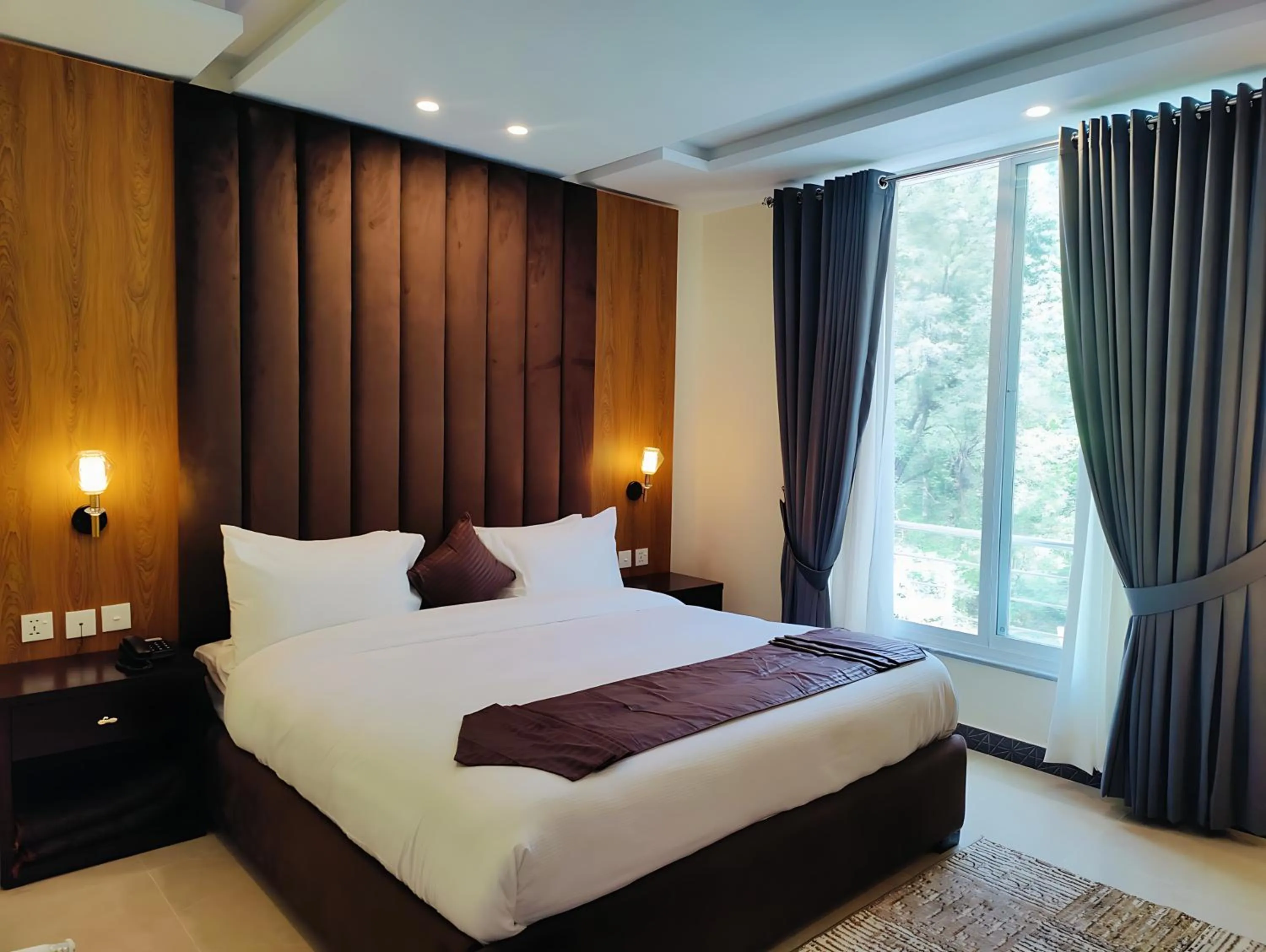 Bedroom in Pinemont Hotel, Murree
