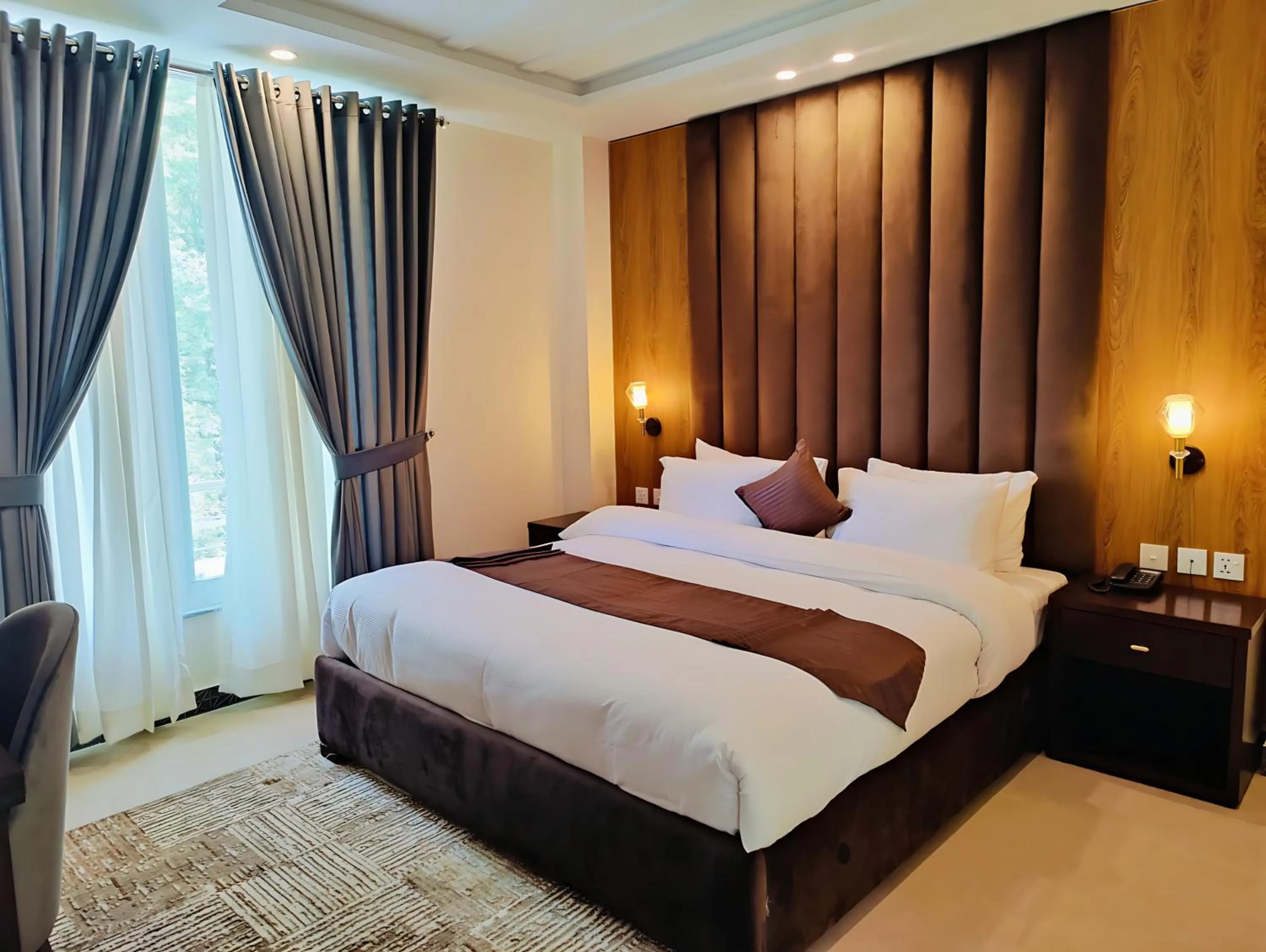 Bedroom in Pinemont Hotel, Murree