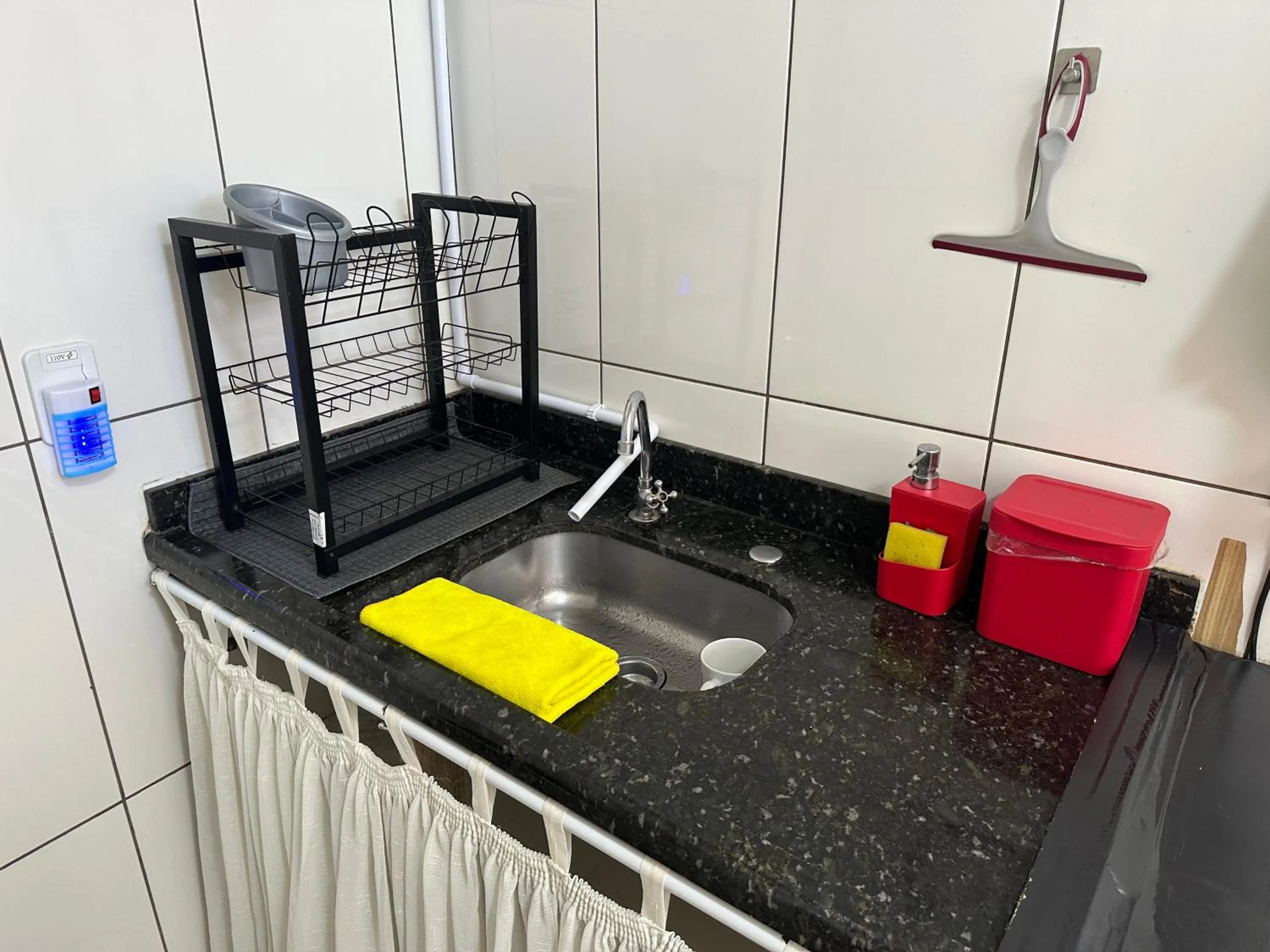 Kitchen or kitchenette in Hotel Vitória - Guaíra