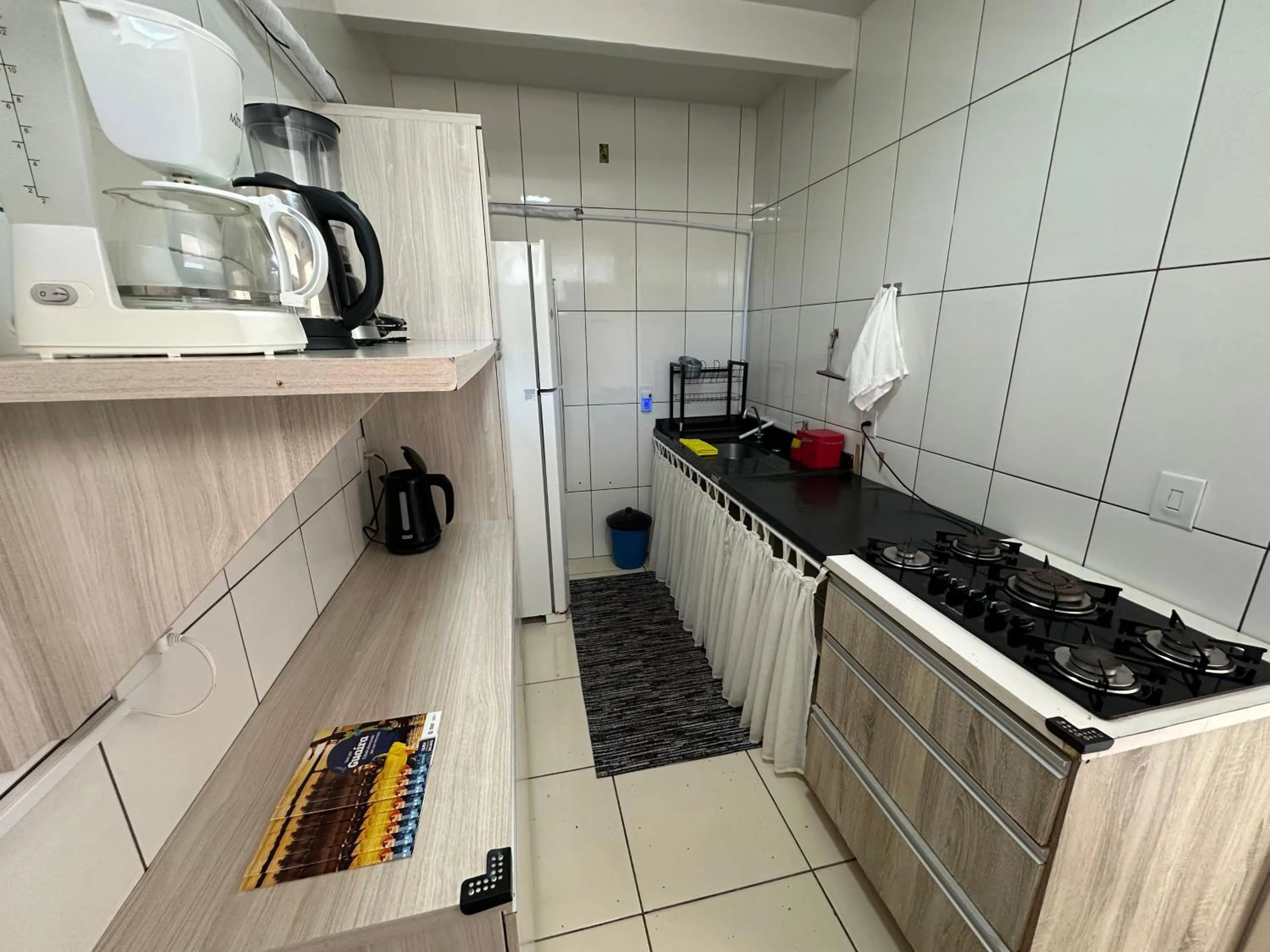 Kitchen or kitchenette in Hotel Vitória - Guaíra