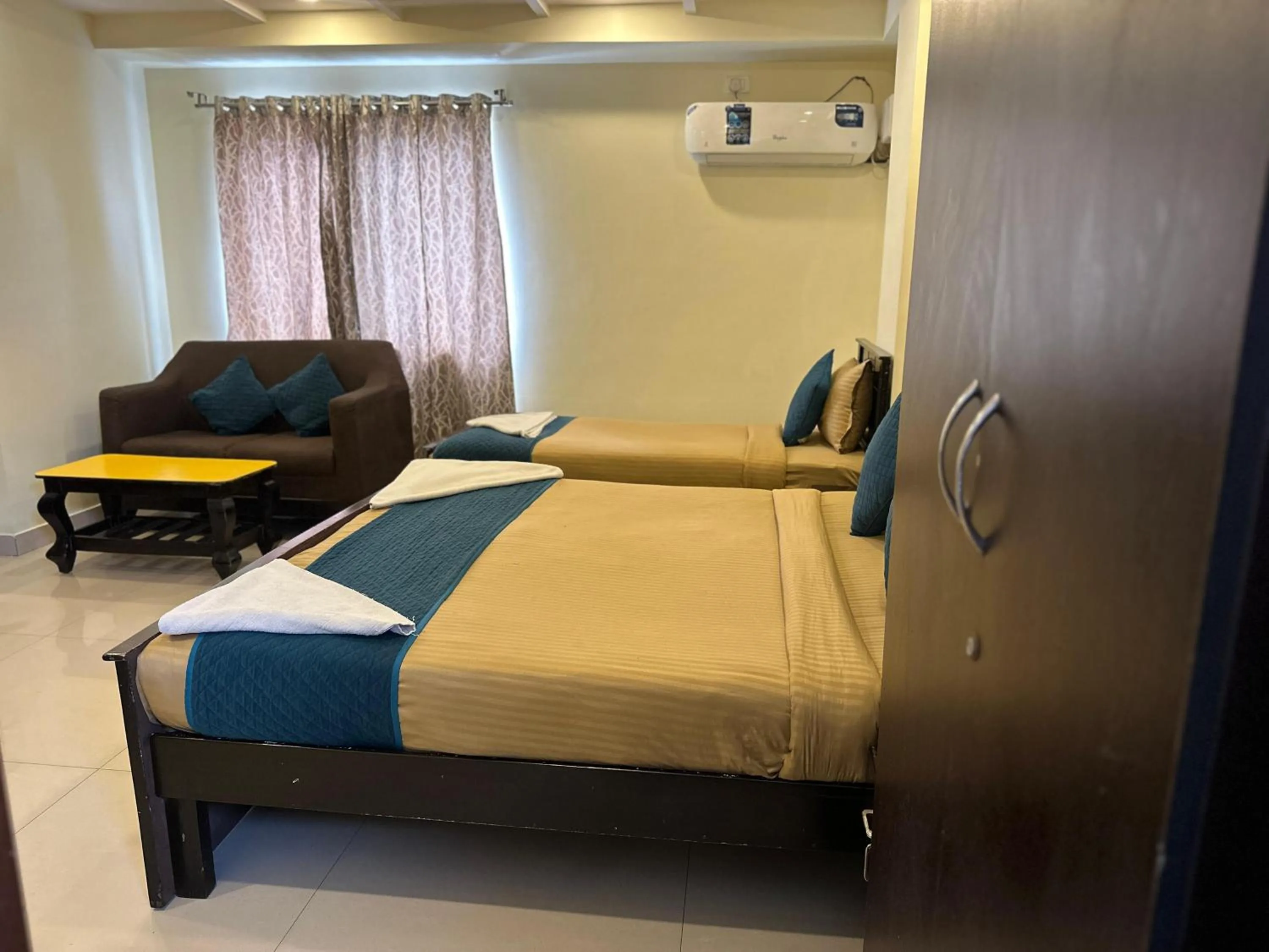 Photo of the whole room, Bed in Blue Bliss Suites By PPH Living