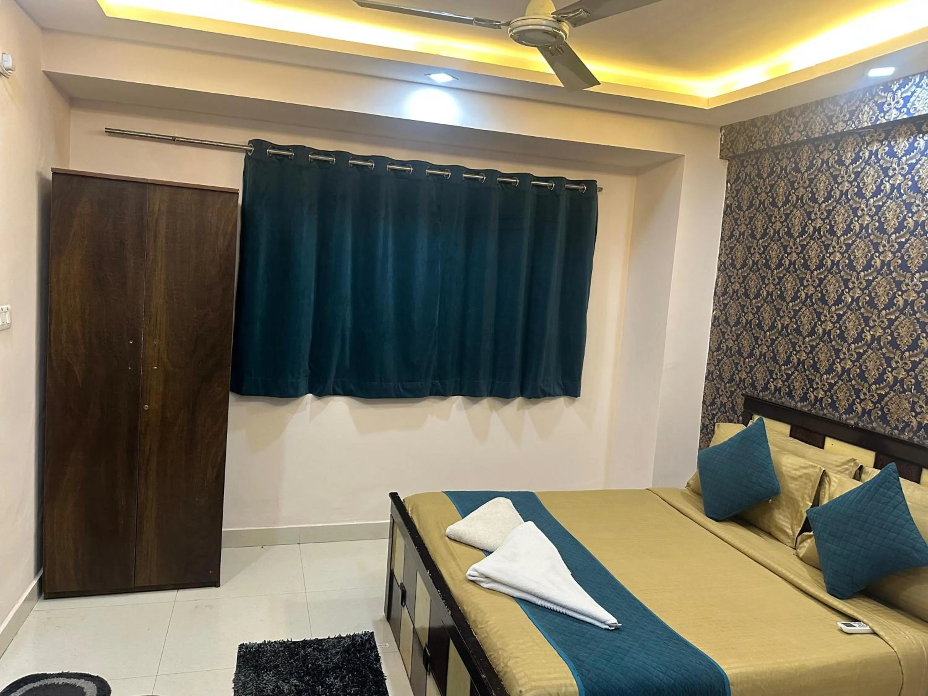 Bedroom, Bed in Blue Bliss Suites By PPH Living