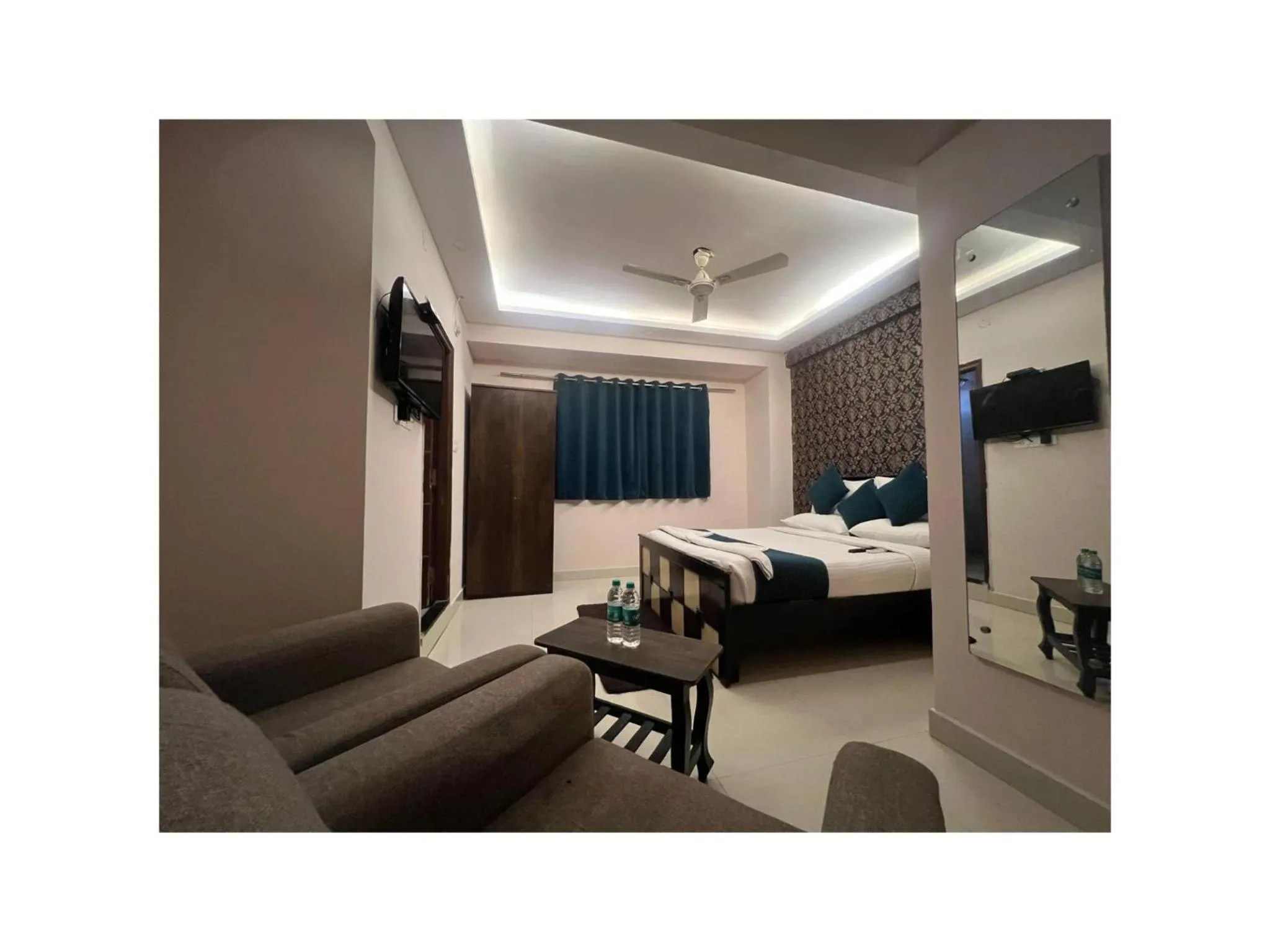 Bed in Blue Bliss Suites By PPH Living