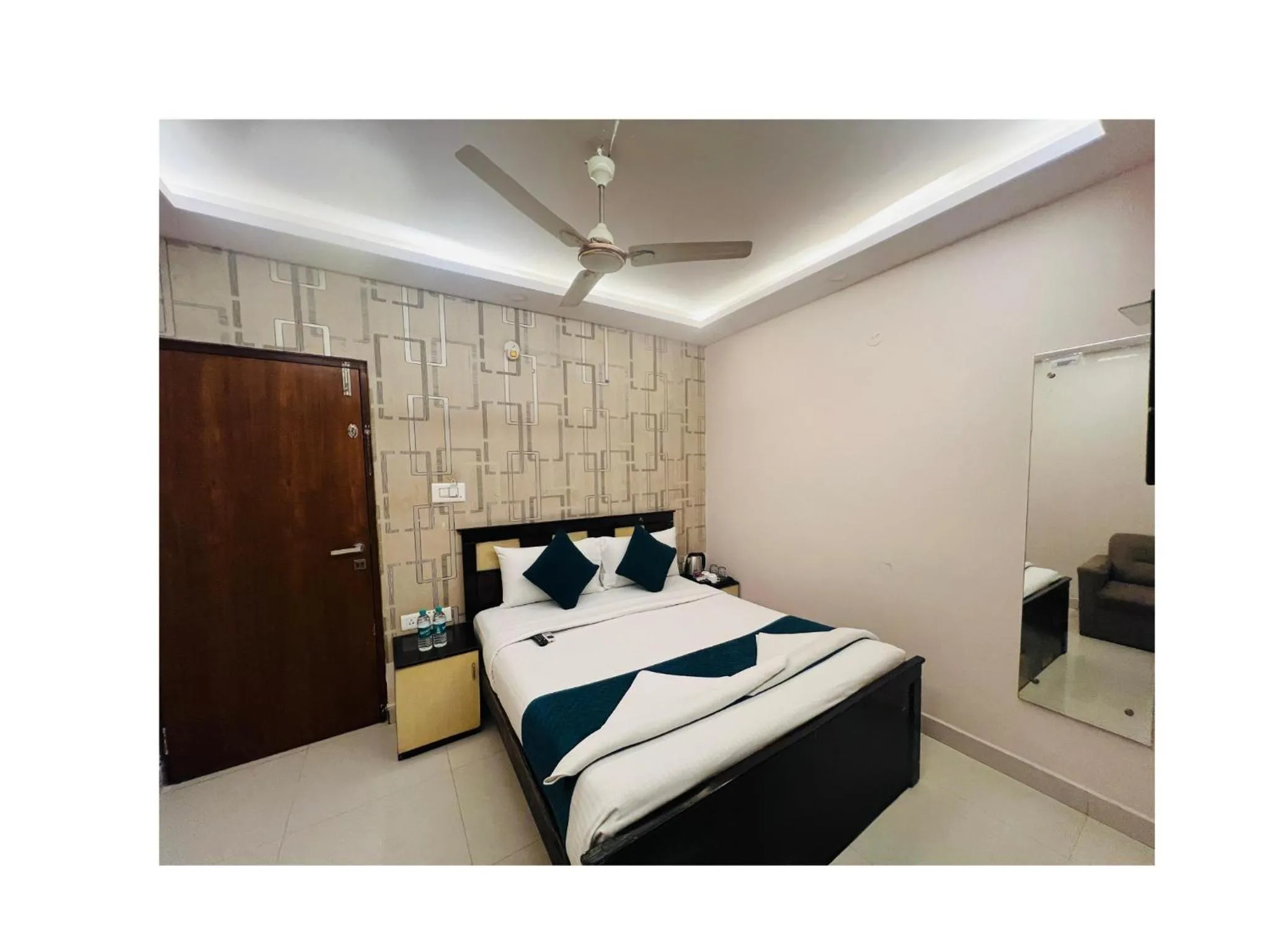 Bed in Blue Bliss Suites By PPH Living