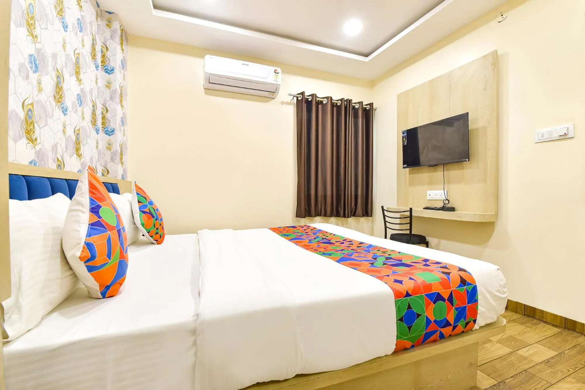 Bed in FabHotel Bhavna Palace