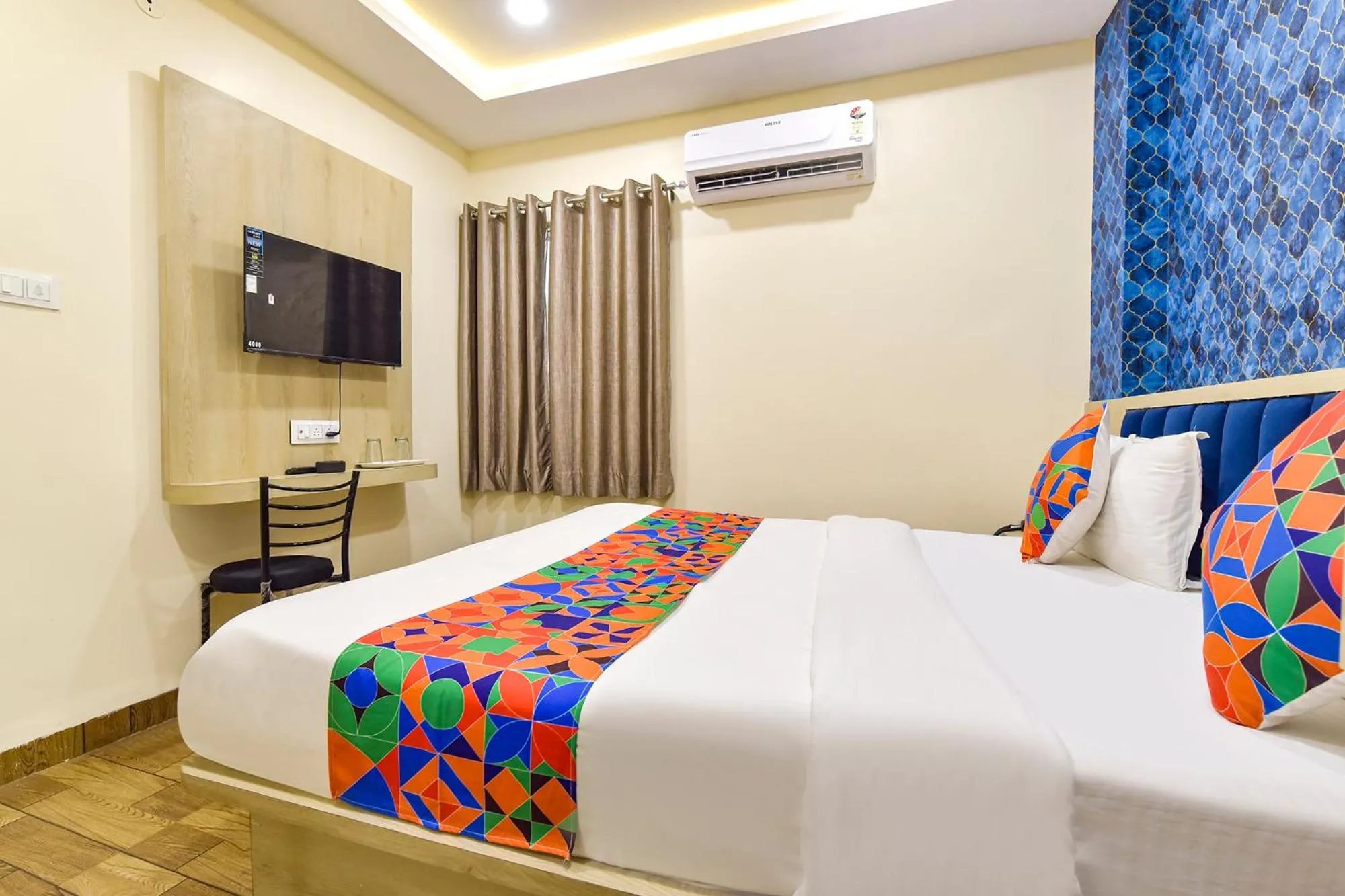 Bed in FabHotel Bhavna Palace