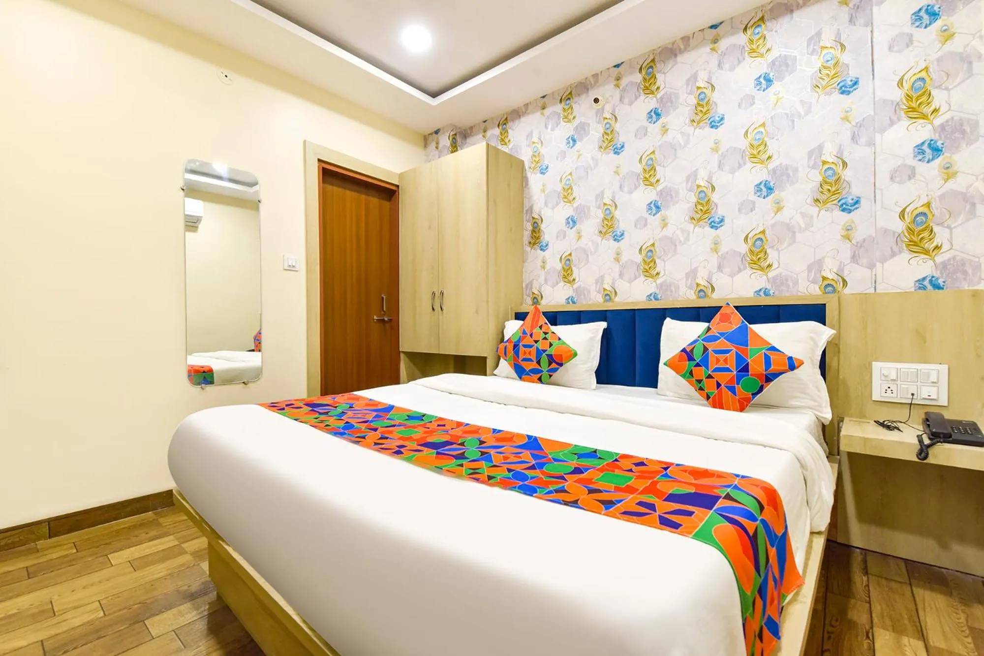 Bed in FabHotel Bhavna Palace