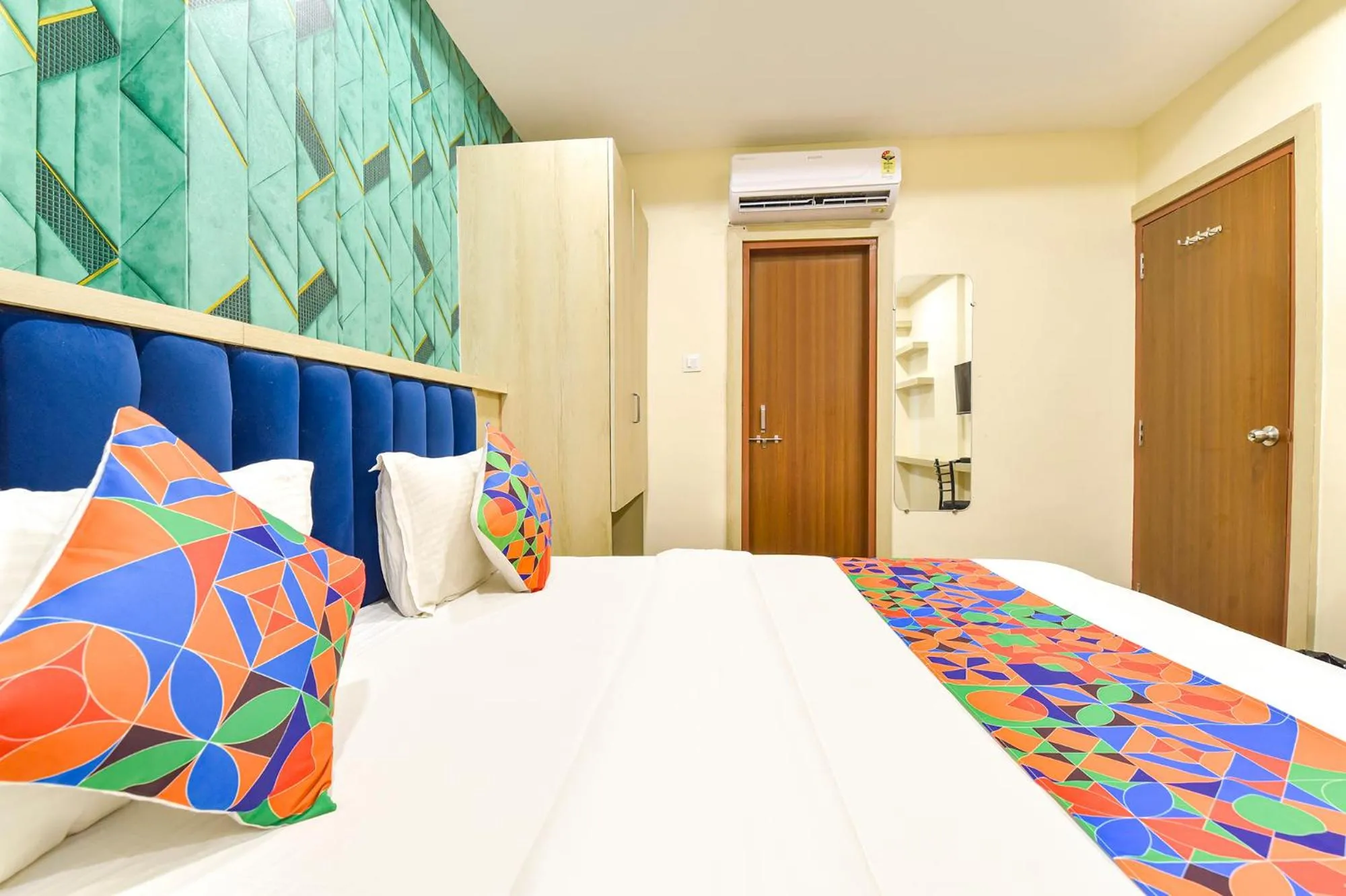Bed in FabHotel Bhavna Palace