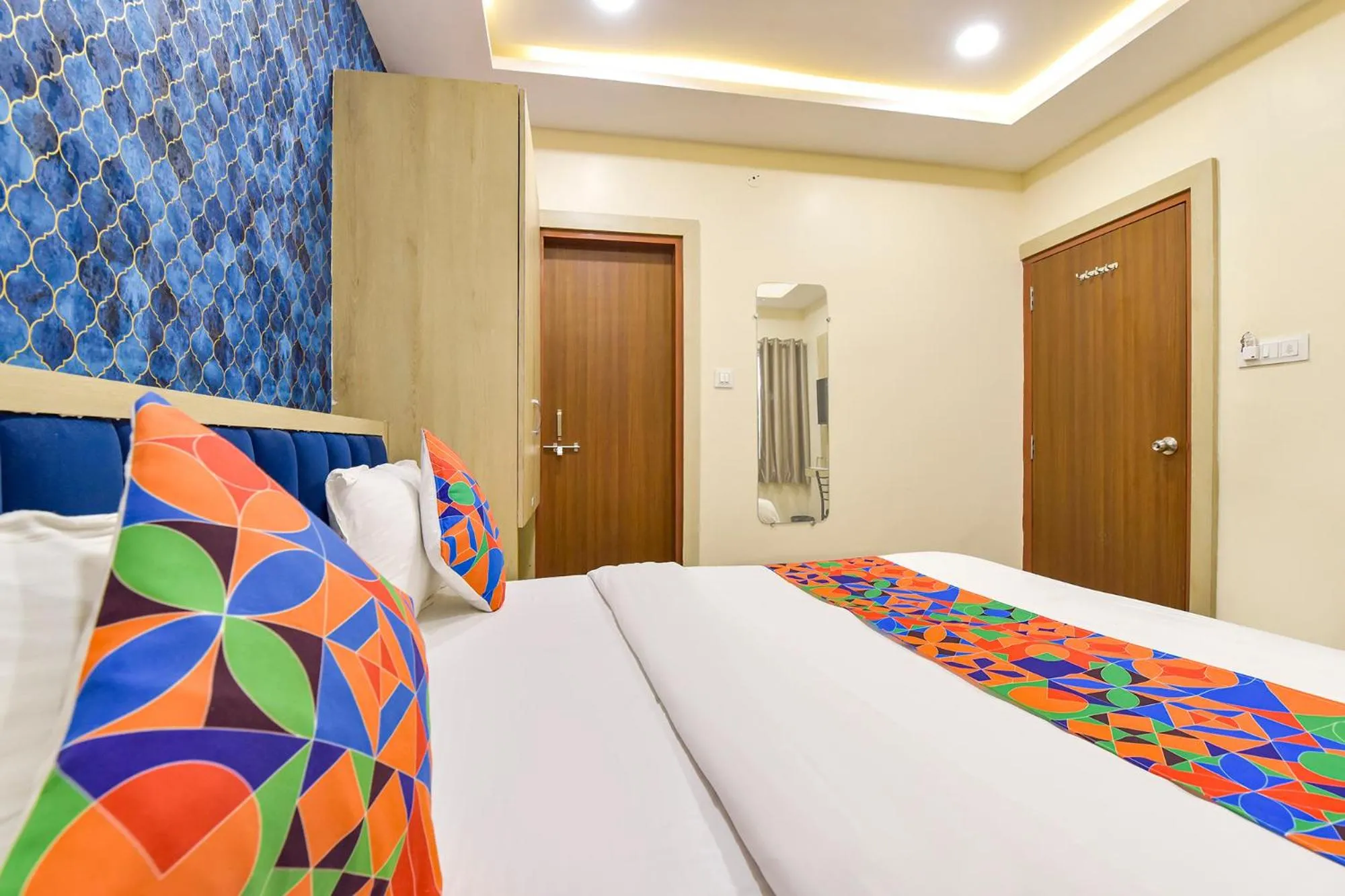 Bed in FabHotel Bhavna Palace