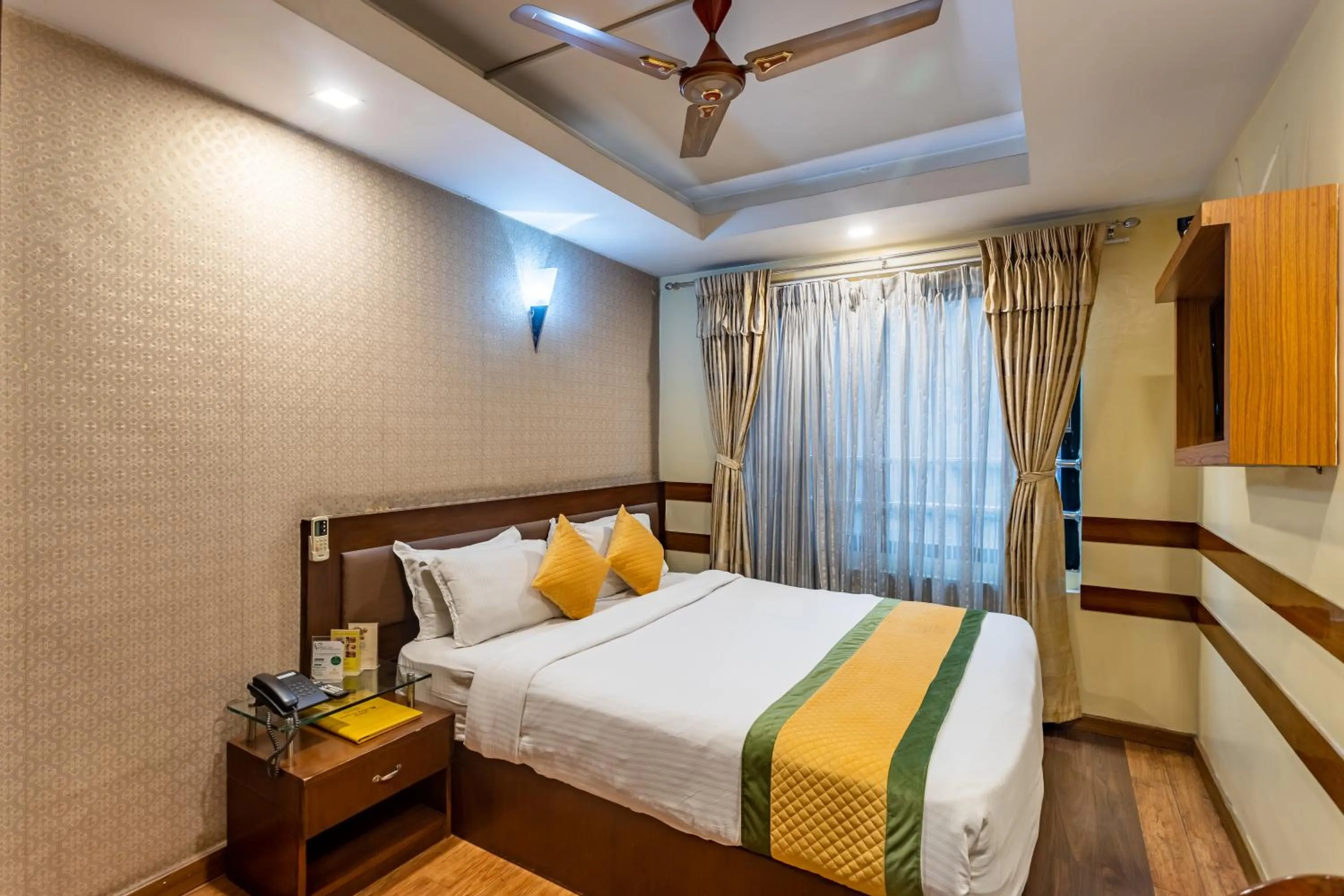 Bed in Yellow Pagoda Hotel