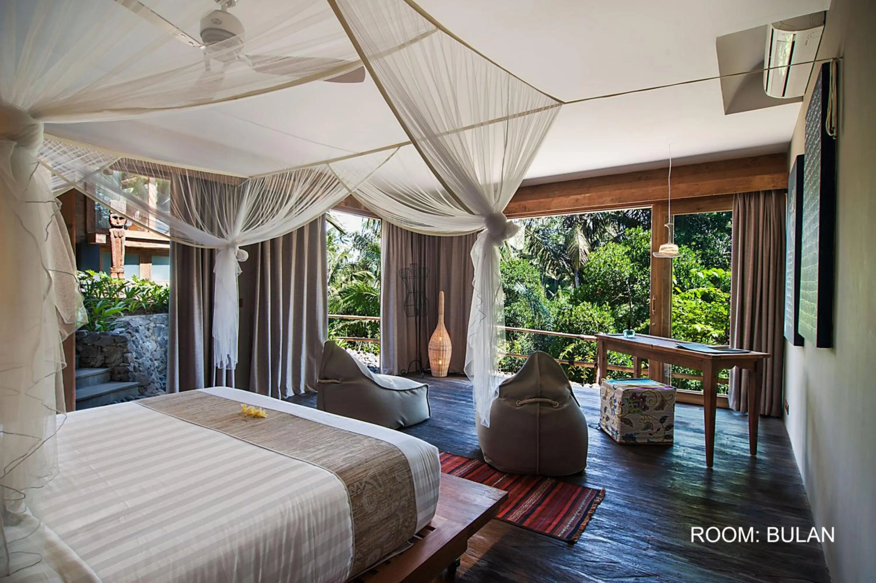 Bed in Blue Karma Dijiwa Ubud
