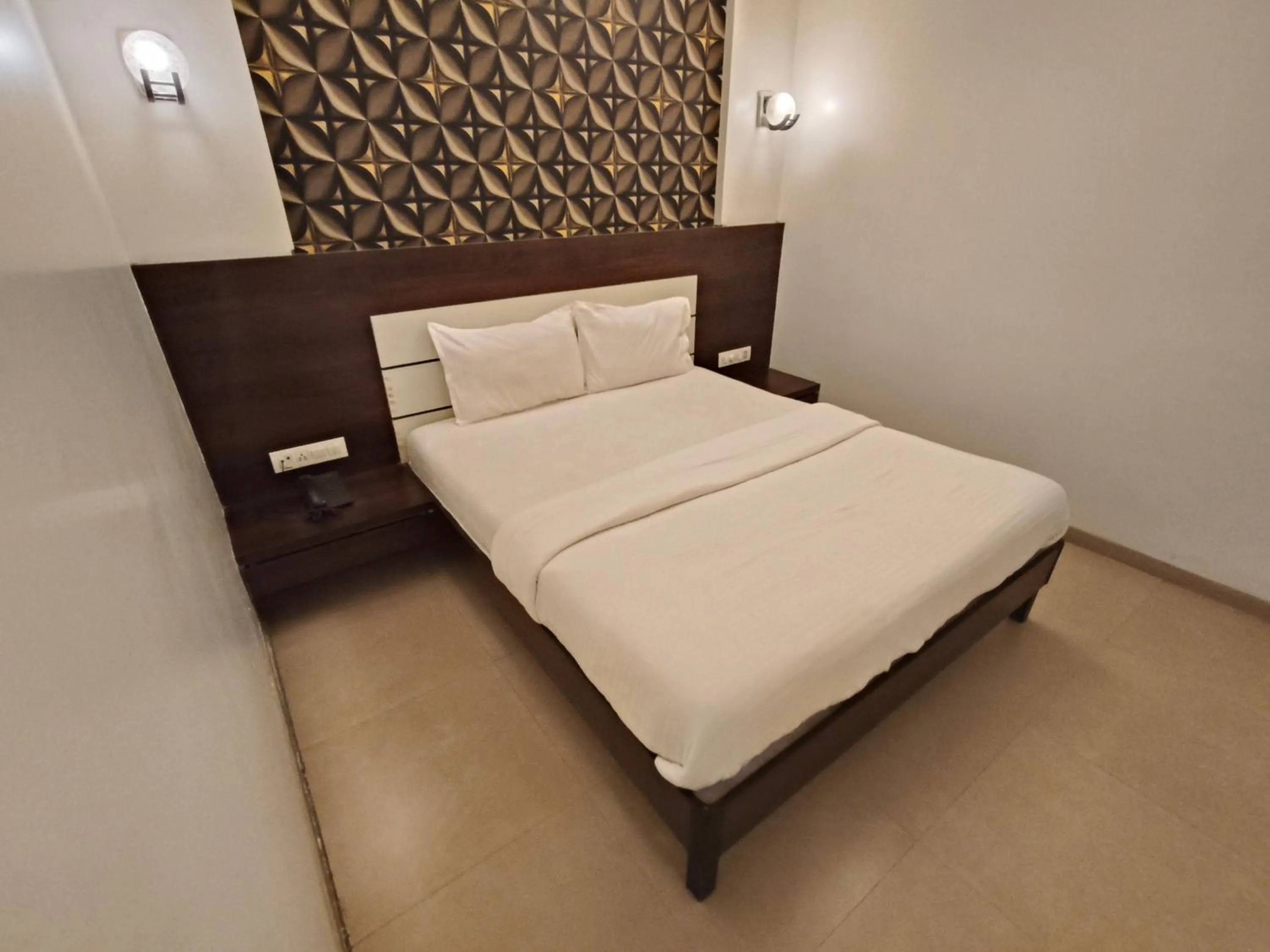 Bed in Hotel Vijay Sagar Dombivali