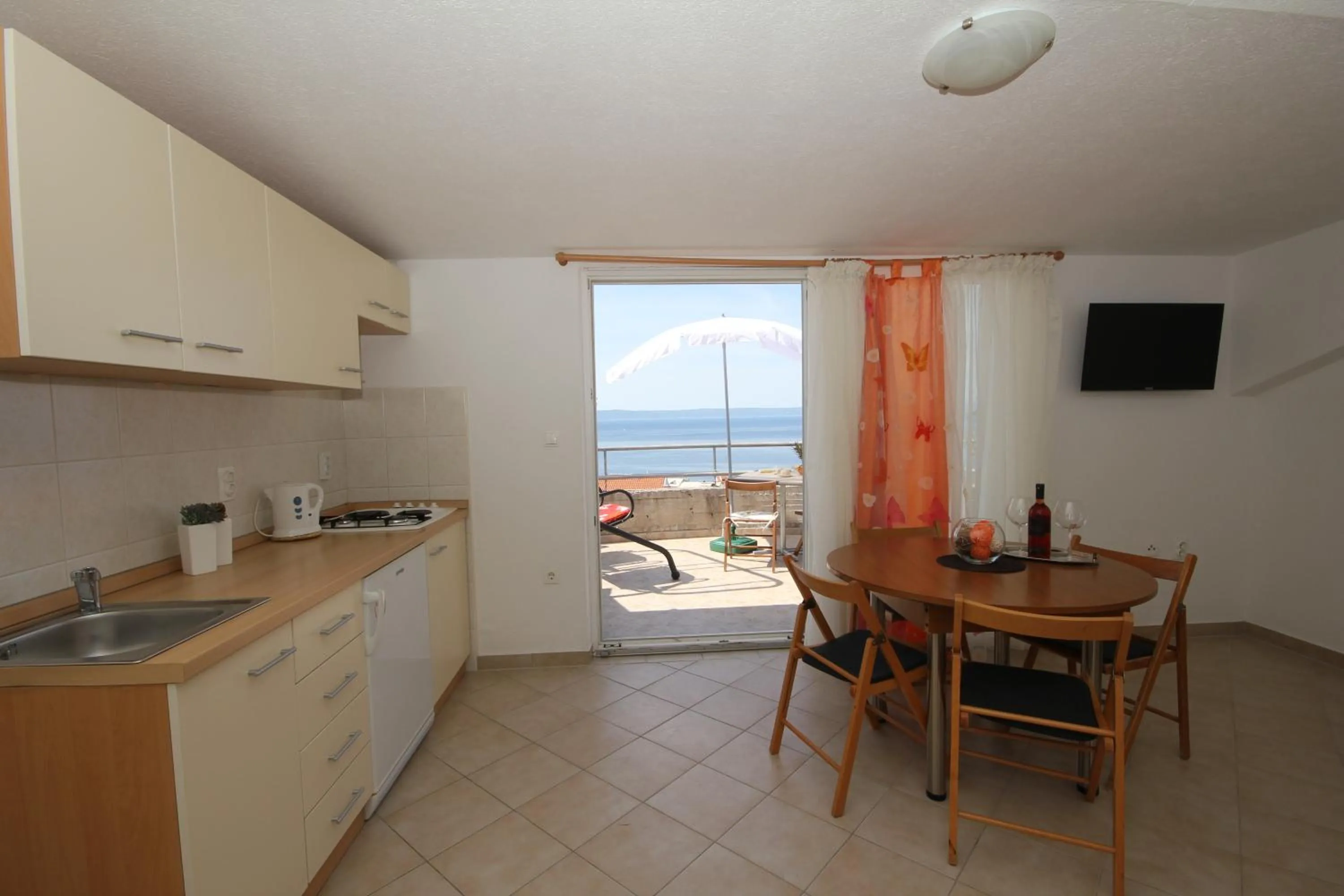 Kitchen or kitchenette in Apartments Adriatika