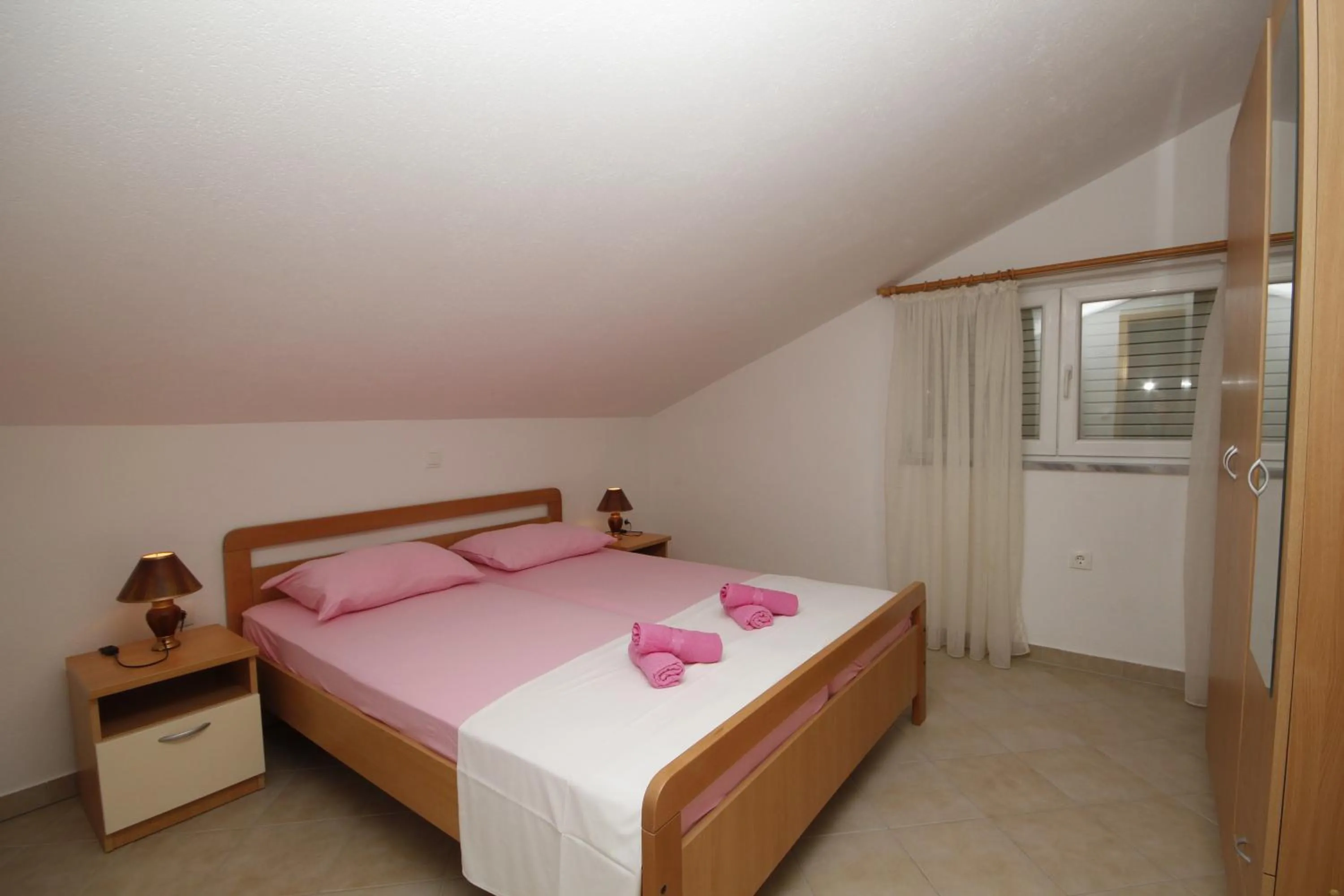Bedroom, Bed in Apartments Adriatika