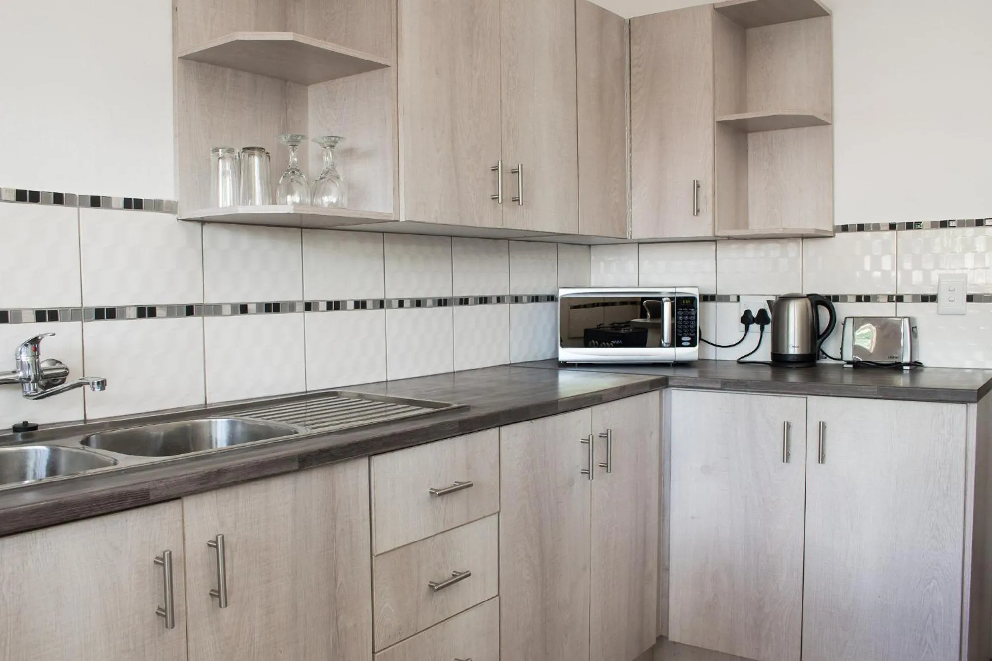 Kitchen or kitchenette in Gemstone Guest House