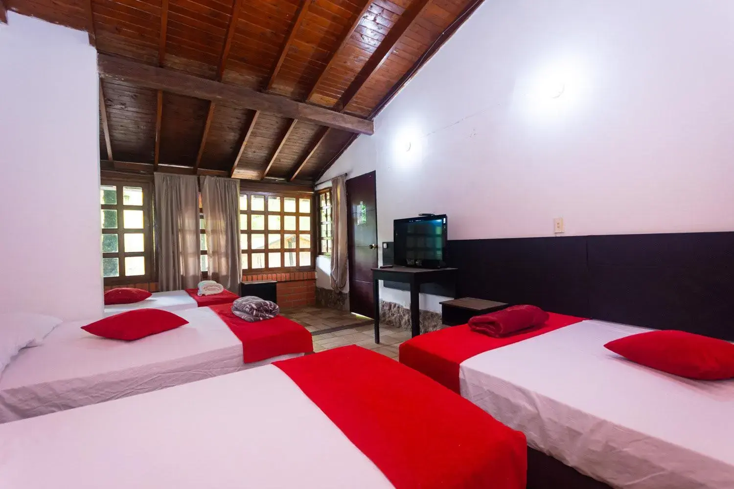 Quadruple Room with Private Bathroom in Finca Hotel Santo Tomas Campestre Quadruple Room with Private Bathroom in Finca Hotel Santo Tomas Campestre
